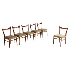 Set of slender mid-century dining chairs with fine curved back, 1960s