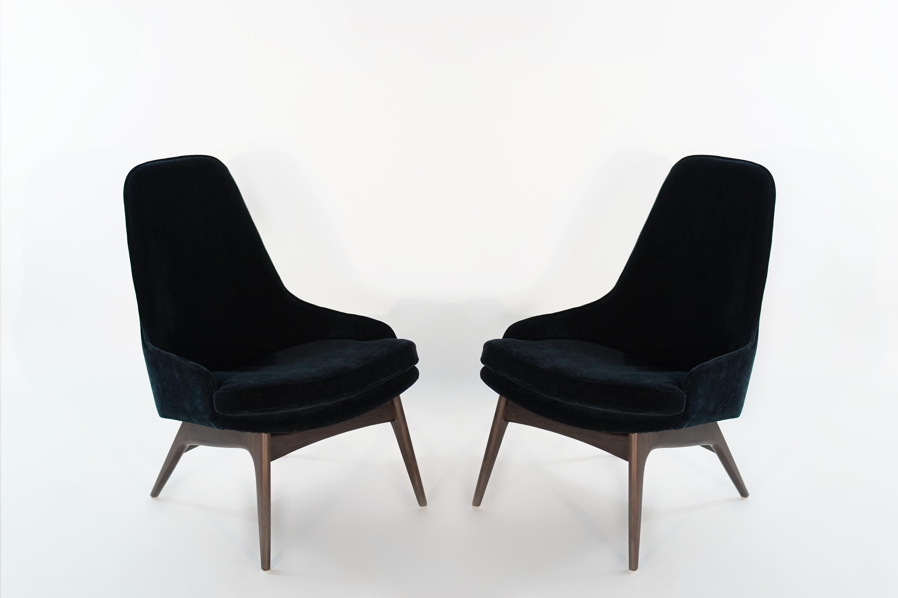 Sculptural set of slipper chairs designed by Adrian Pearsall for Craft Associates, circa 1950s. Walnut bases fully restored, reupholstered in navy blue mohair by Donghia.