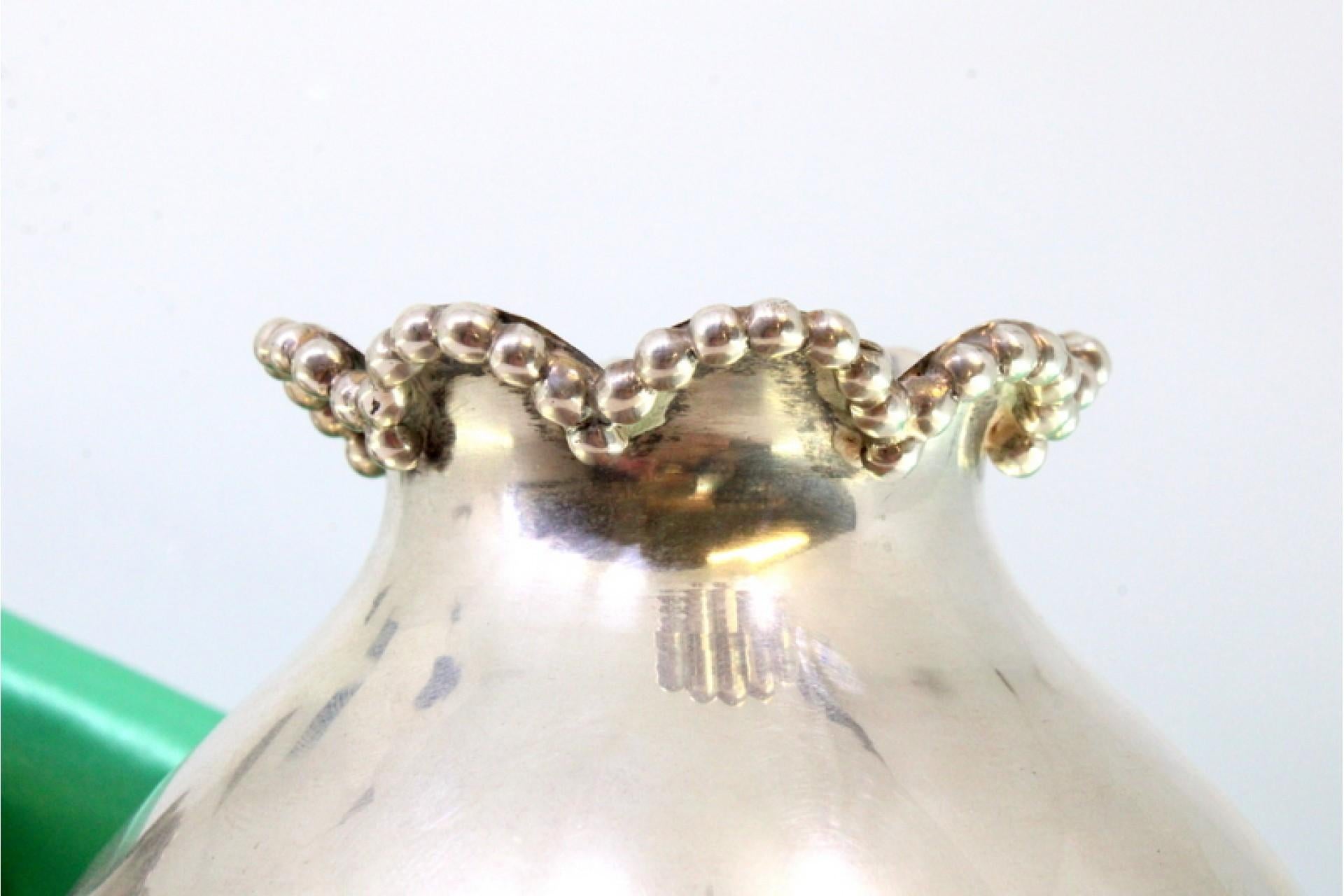 European Set of smooth, round silver jugs with pearls on the rim and circular base For Sale