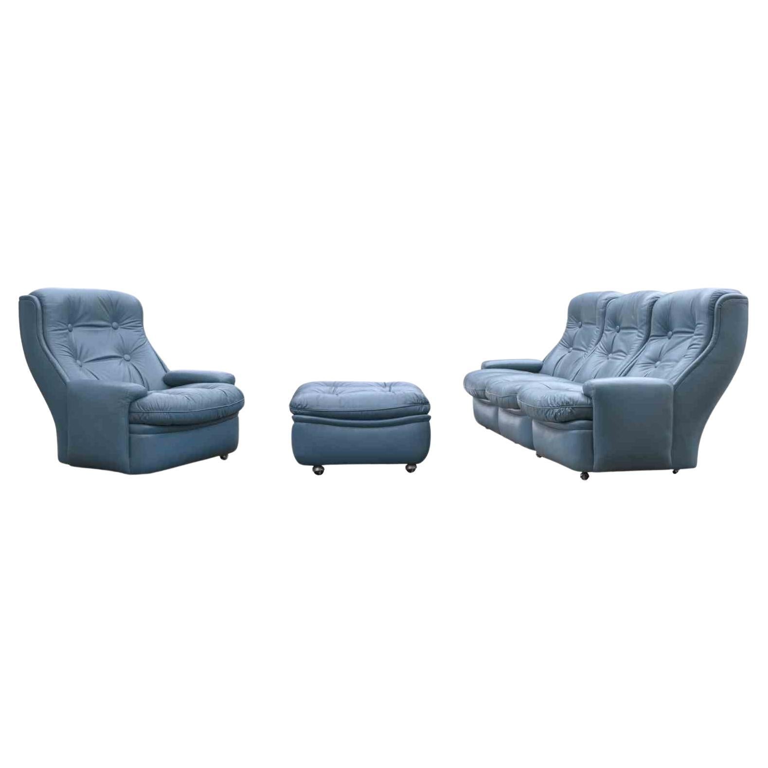 Set of sofa, armchair and pouf is an original design artwork realized by Michele Cadestin for Airbone, France in 1970s.

The set includes a 2 seats sofa, an armchair and a pouf.

Dimensions Sofa L240 H 90 Seat (seduta) 40; Armchair H90 L80 Seat