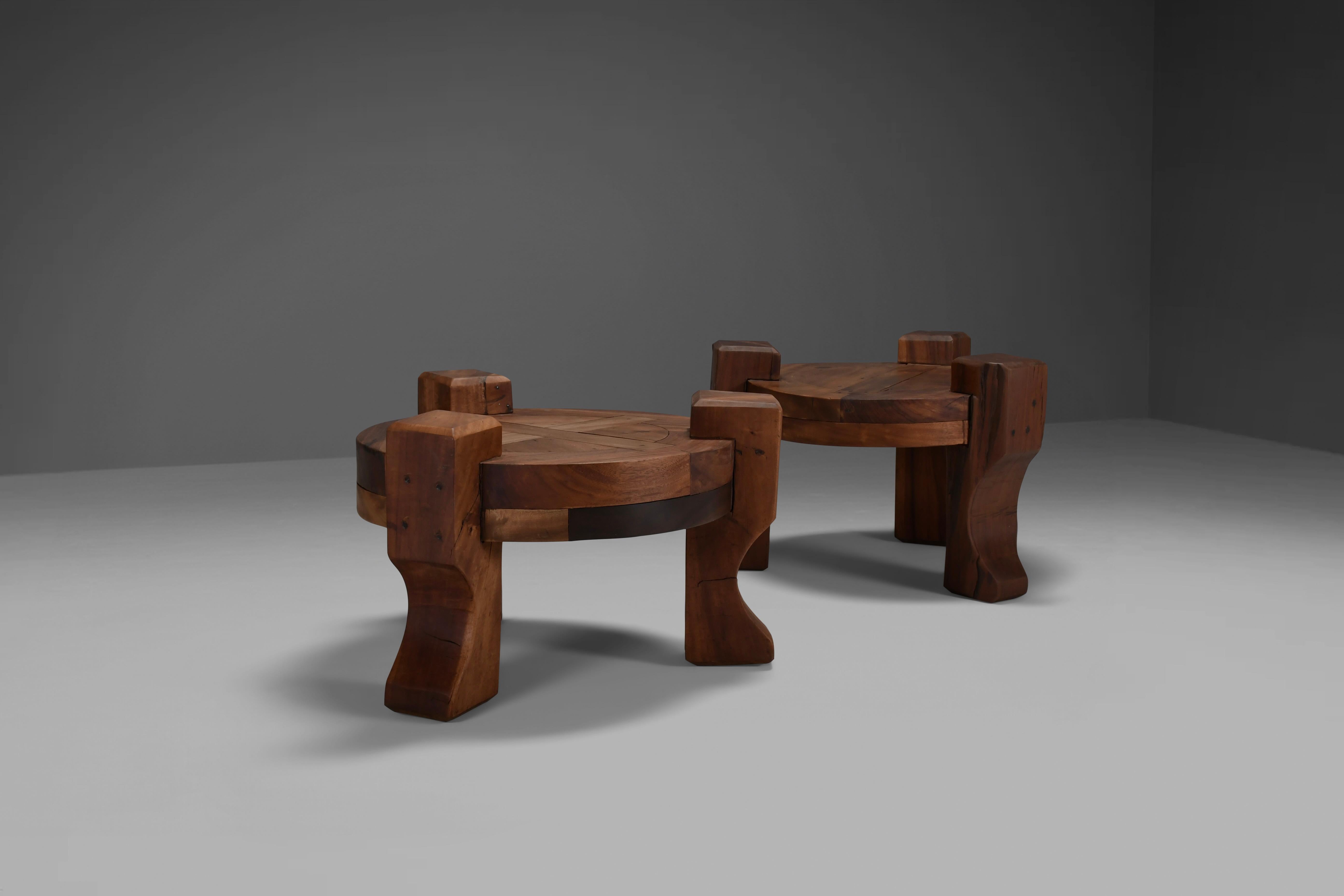 Set of beautiful rustic end tables in very good condition.

These tables were produced in Brazil in the 1960s.

They are made of solid tropical wood and are extremely heavy.

These tables are a celebration of simplicity and unpretentious design. The