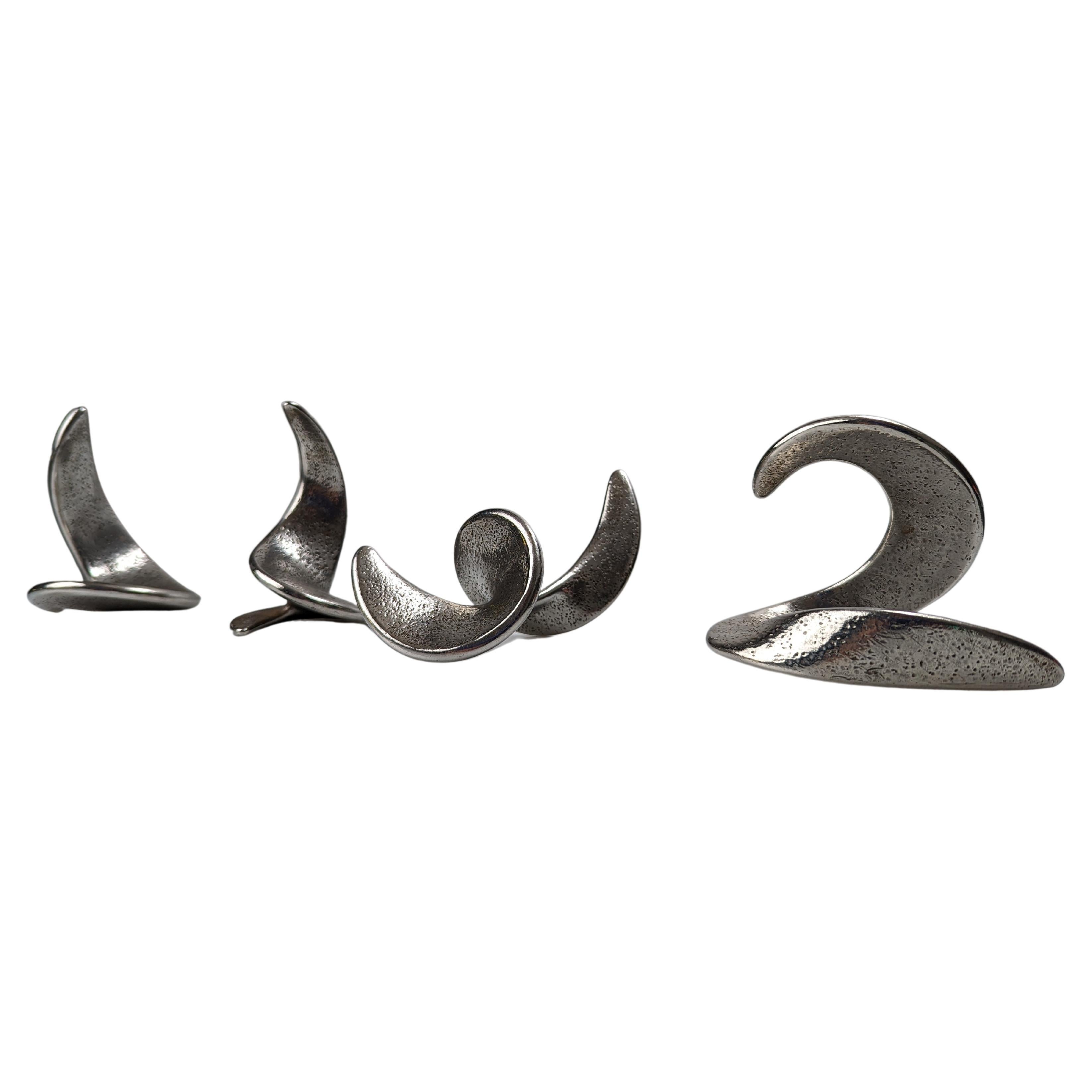 Very interesting set of sculptures with curved spiral shapes signed by the artist, numbered and dated. Each sculpture was made in a different year from 1987 to 1990, with only 150 units worldwide and as we can see in the numbering they make up a