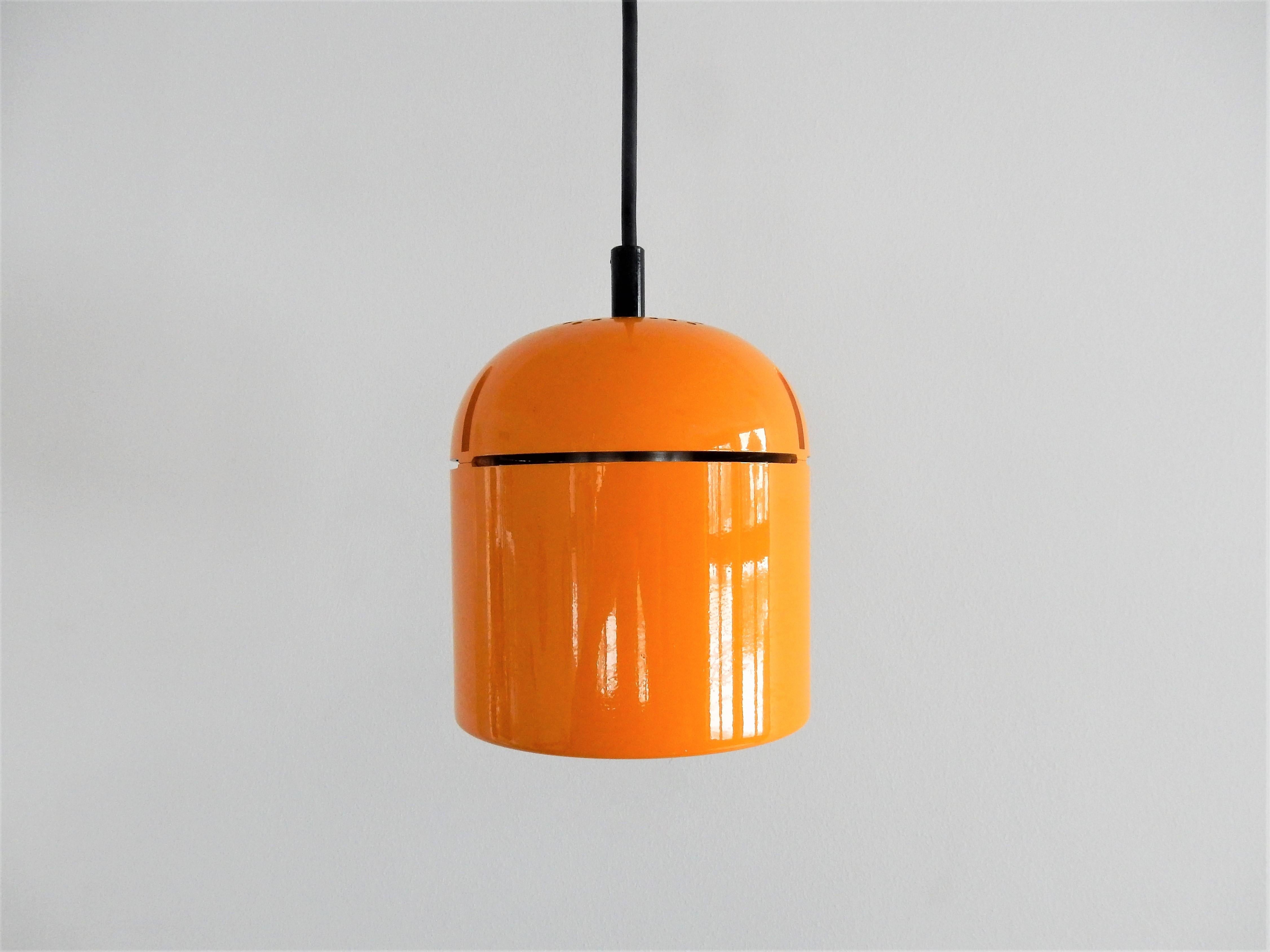This set of spotlight and pendant lamp was designed by Arnold Berges for Staff Leuchten in Germany in the 1970s. A stunning design that won the iF Product Design Award in 1973. The lamps have a tumbular yellow painted thick acrylic lampshade,