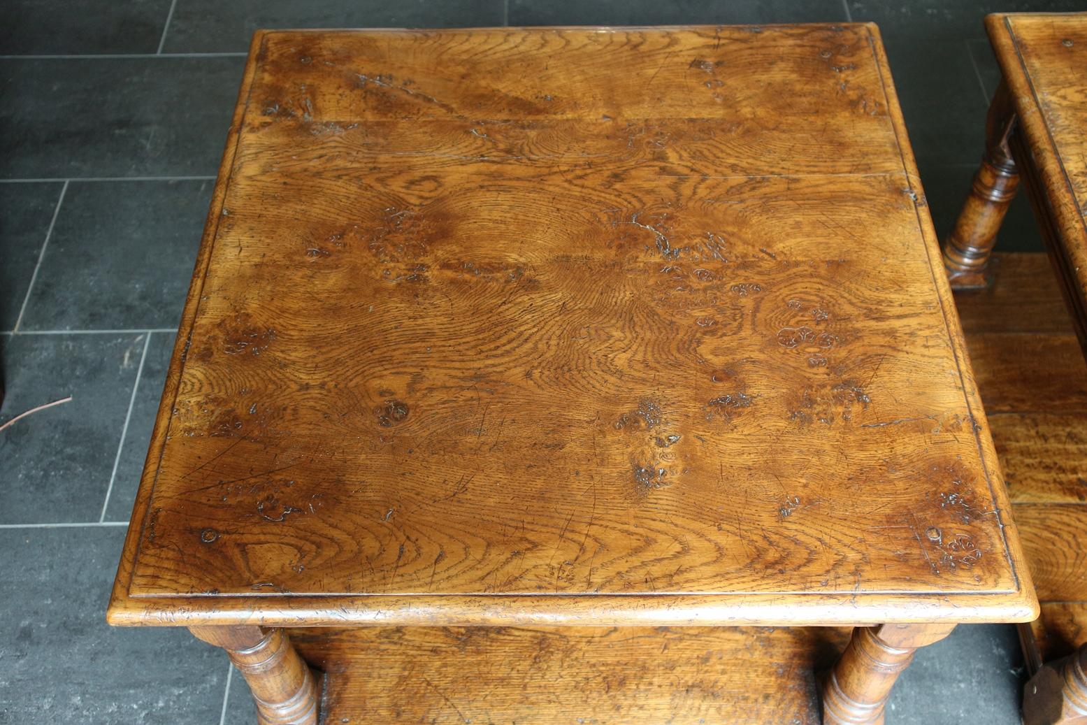 Set of square oak side tables with bottom shelf in very good condition. Warm color and beautiful oak. (pollard oak)
Together as a coffee table or as tables next to a couch.
Origin: England, 20th century
Size: 49cm x 49cm x H 46cm.
 