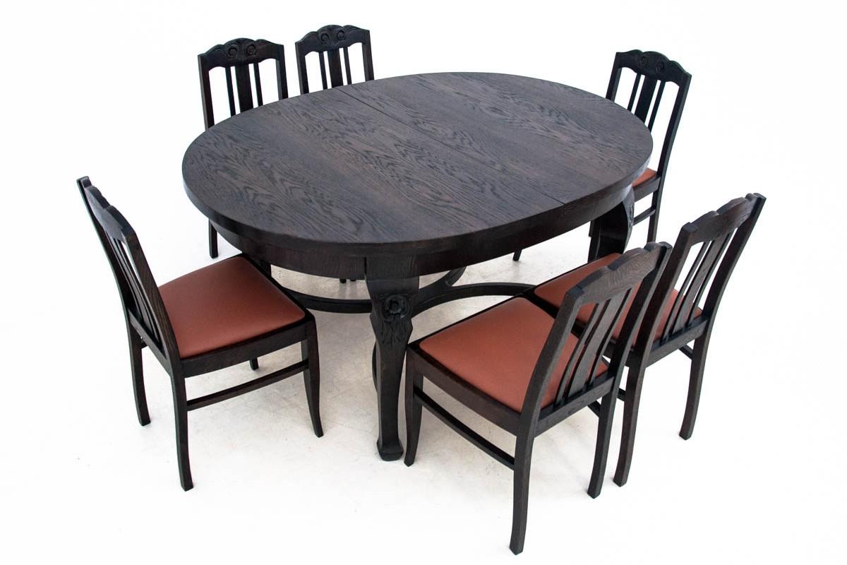 A set of table and 6 chairs, Art Nouveau, Poland, circa 1930.

Very good condition, after renovation and replacement of the upholstery with new leather.

Wood: oak

Dimensions:

Chairs height 91 cm, seat height 46 cm, width 44 cm, depth 48