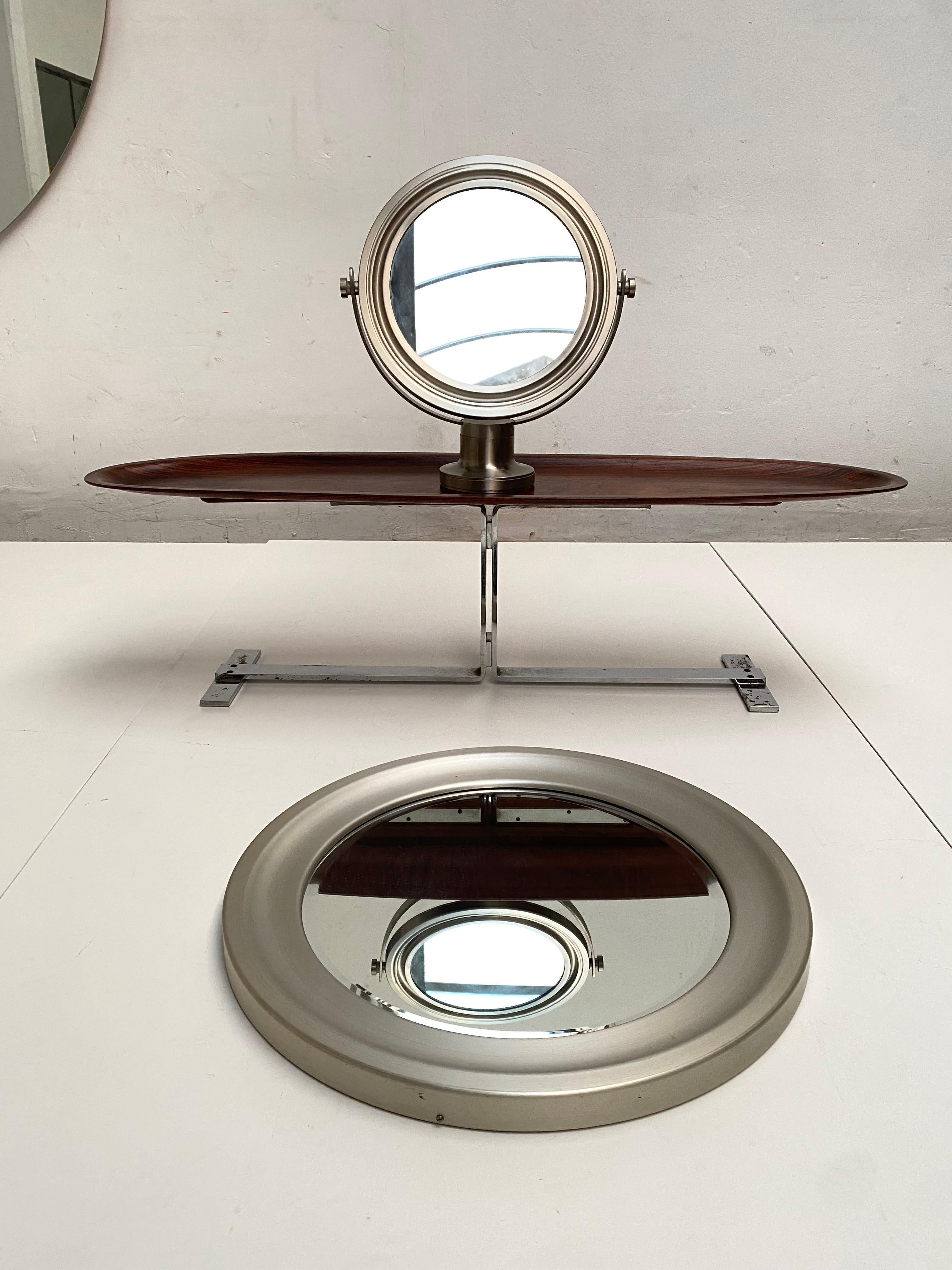 Unique opportunity to get your hands on a set of Sergio Mazza 'Narciso' Mirrors for Artemide Italy 1969

A swivelling table mirror and a large round wall mirror by the same designer 

Both mirrors are in a very respectable original vintage condition