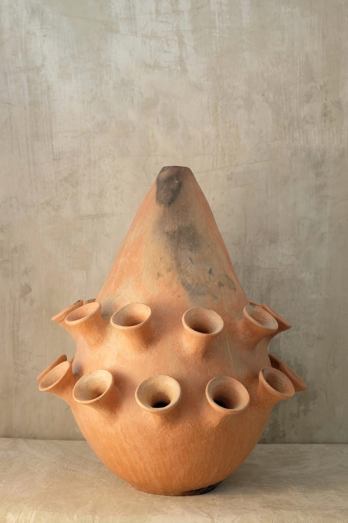 Set of Tama vases by Onora
Dimensions: 
D 45 x H 68 cm
D 60 x H 80 cm
Materials: Clay

Inspired in the traditional large format vessels used to store water, grains or prepare food, our playful reinterpretation of Mixe pottery plays homage to