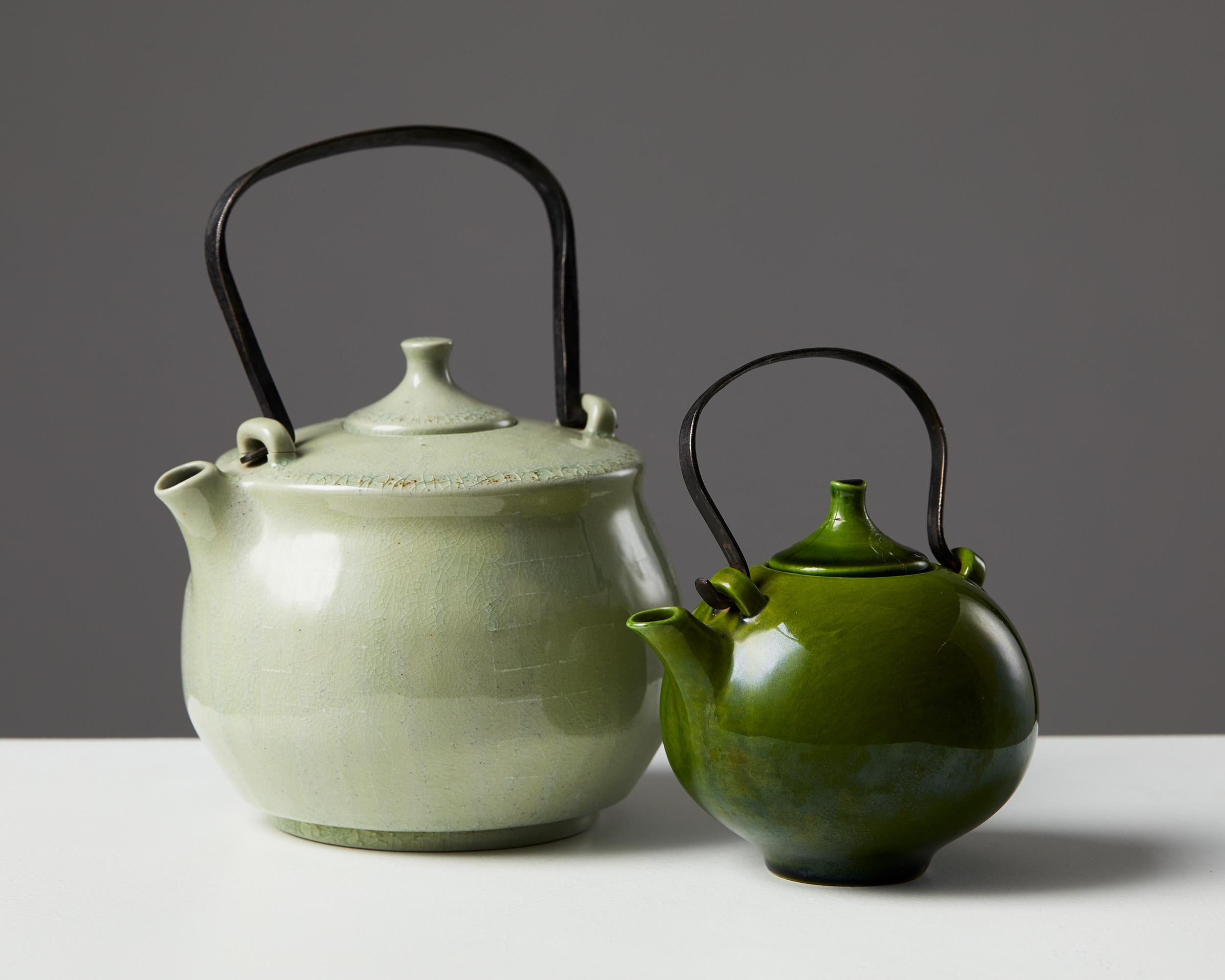 Glazed ceramic. Repairs.

Large teapot:
H: 18 cm/ 7 1/8