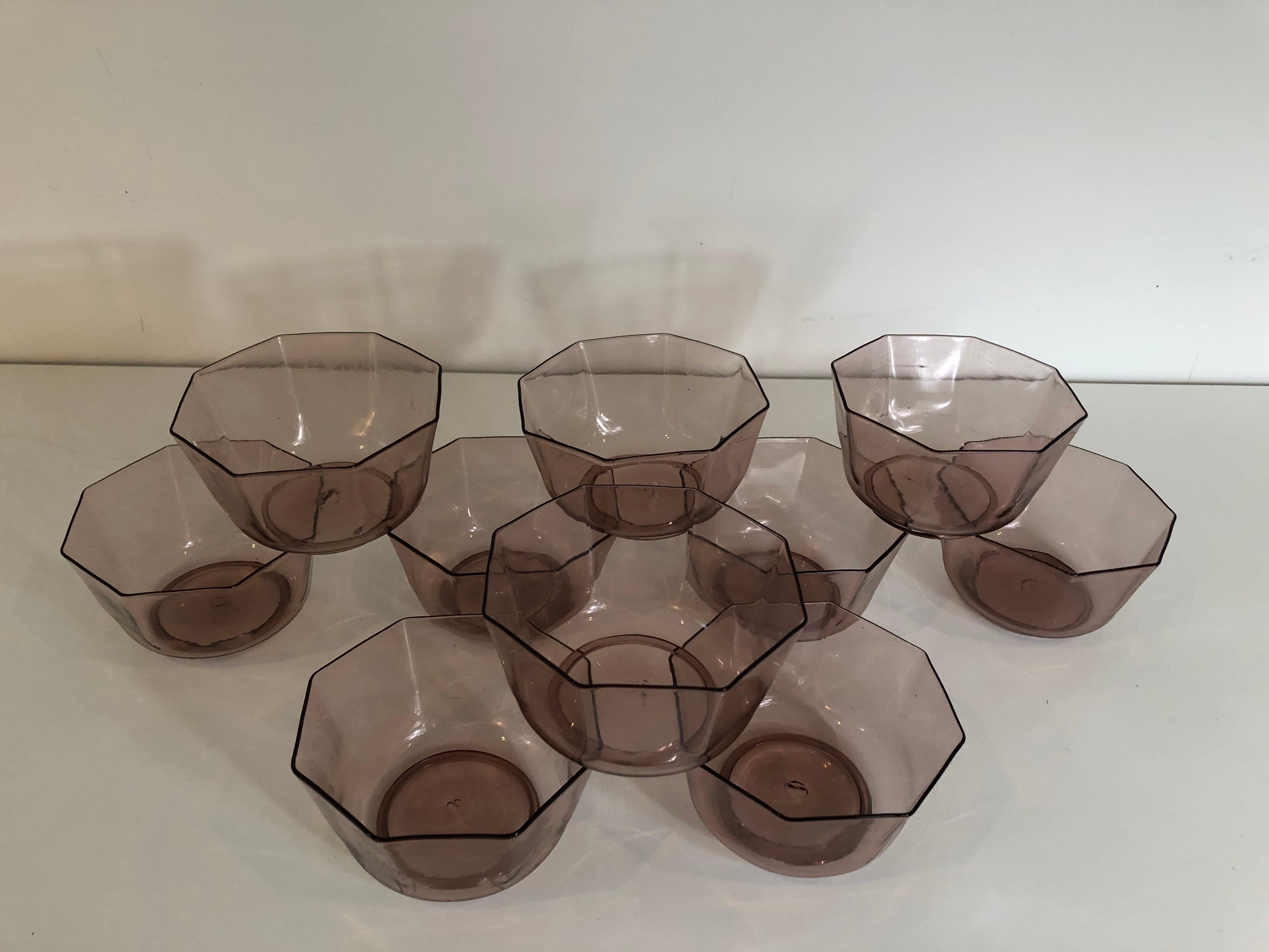 A set of ten amber Venetian glass bowls or cups. Matching set of plates also available.