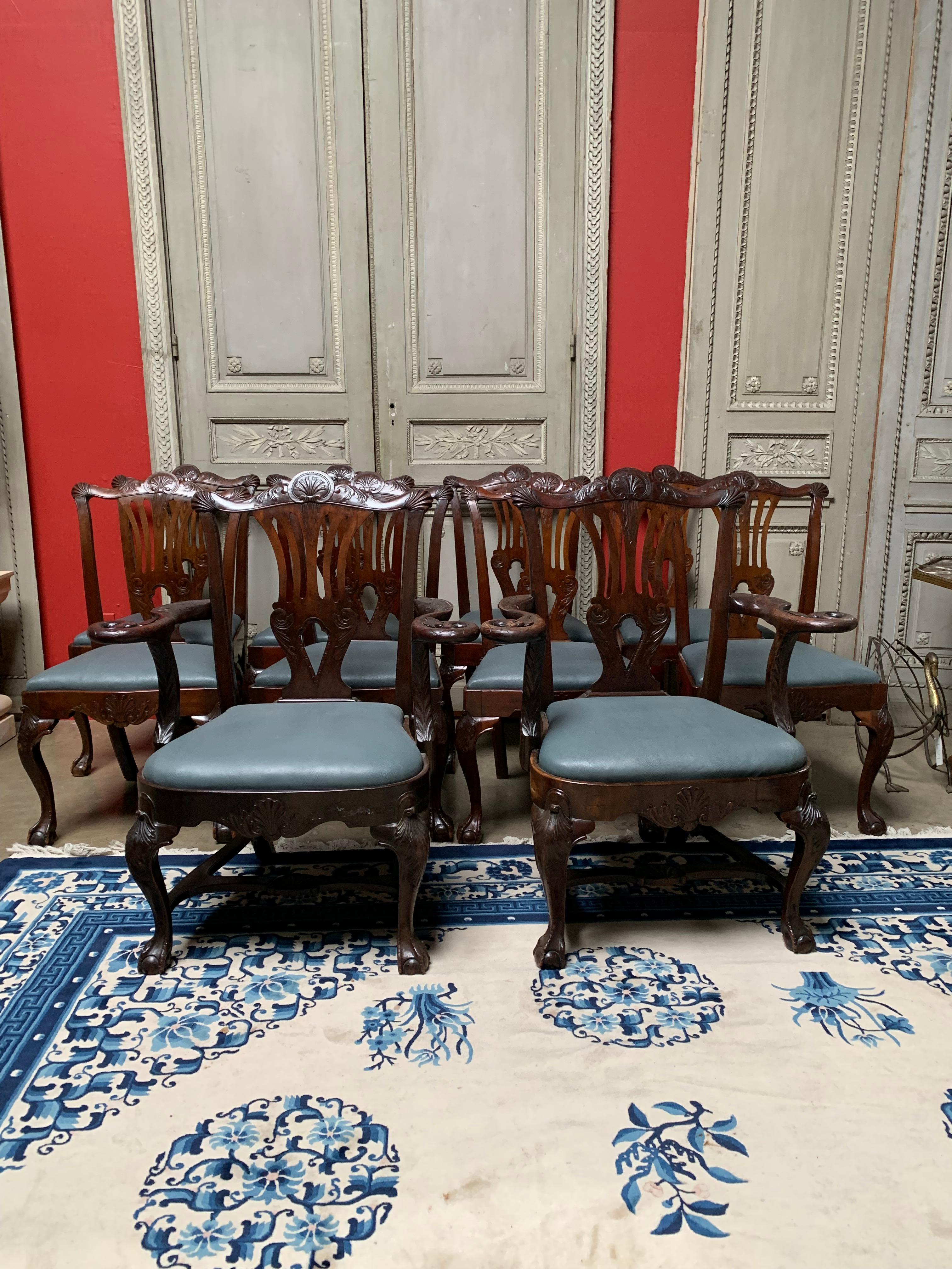 A set of 10 American Chippendale style carved mahogany dining chairs, 8 sides and 2 arms, from the north east coast of the United States, probably Philidelphia. 
They are beautifully carved, nicely scaled and are crafted of beautifully colored