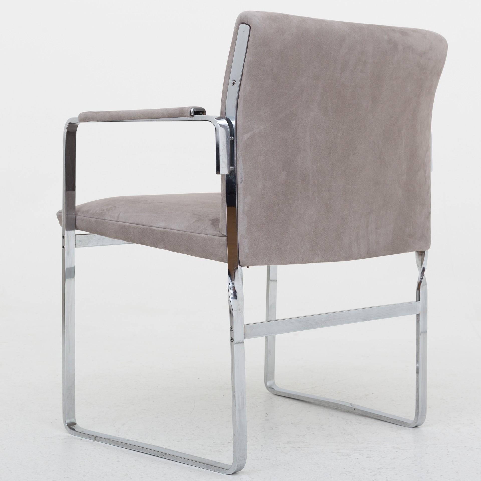 JH 811 - Reupholstered armchair in Royal Nubuck lava and steel frame. Maker Johannes Hansen.