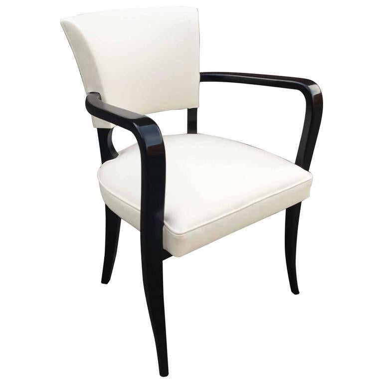 Set of ten Art Deco armchairs in blackened wood and ivory color leather
Full restored.
armrest height: 26.13