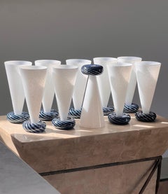 Set of ten art glass champagne flutes by R. Guy Corrie, late 20th century