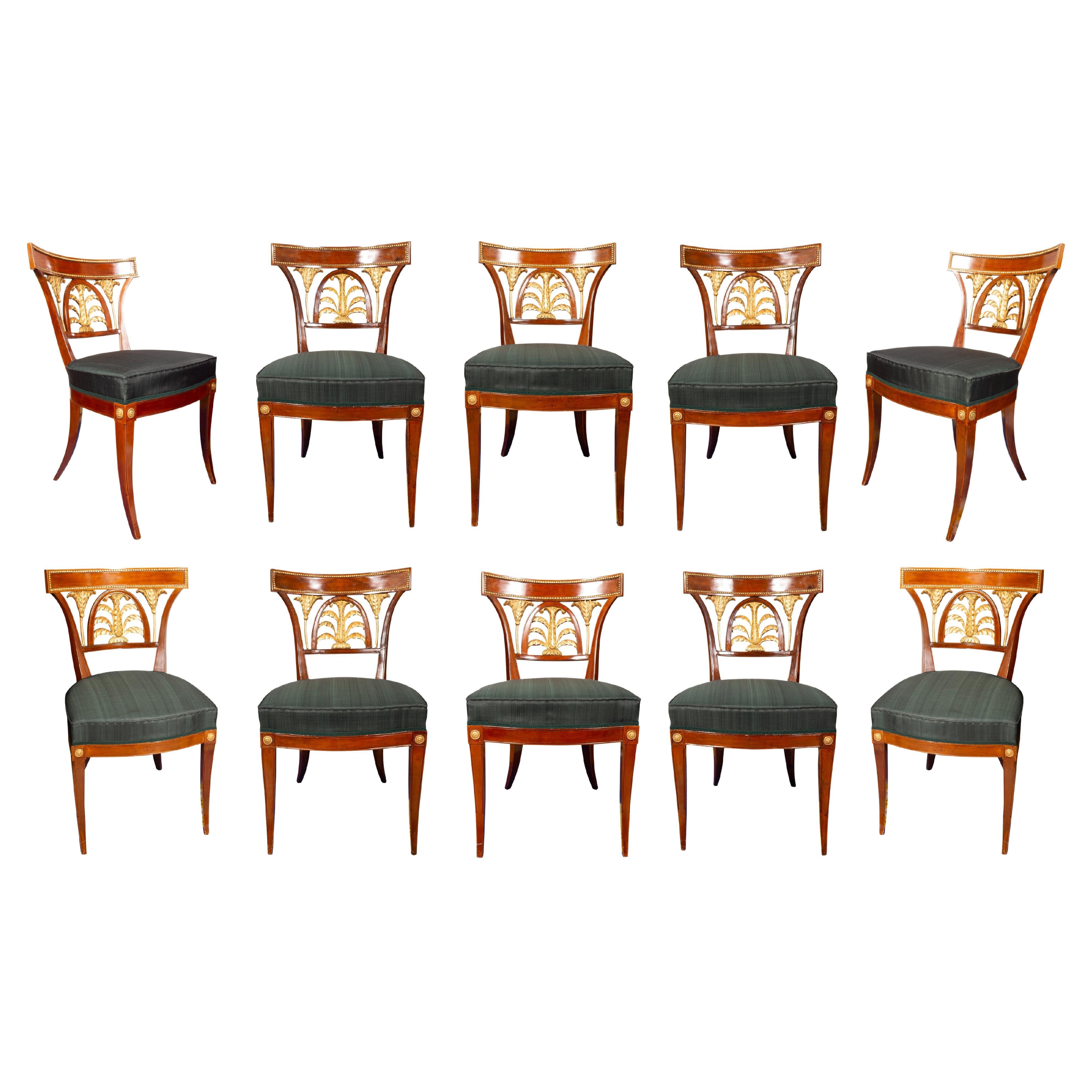 Set of Ten Baltic Neoclassical Mahogany and Giltwood Dining Chairs For Sale