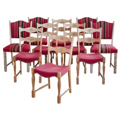 Set of Ten Brutalist Dining Chairs in Solid Carved Oak by Henning Kjærnulf 60's