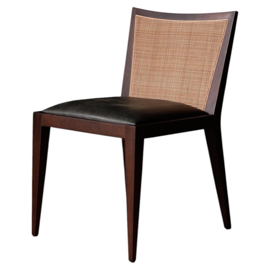 Set of Ten Cane‑Back Dining Chairs with Dark Green Leather Seats For Sale