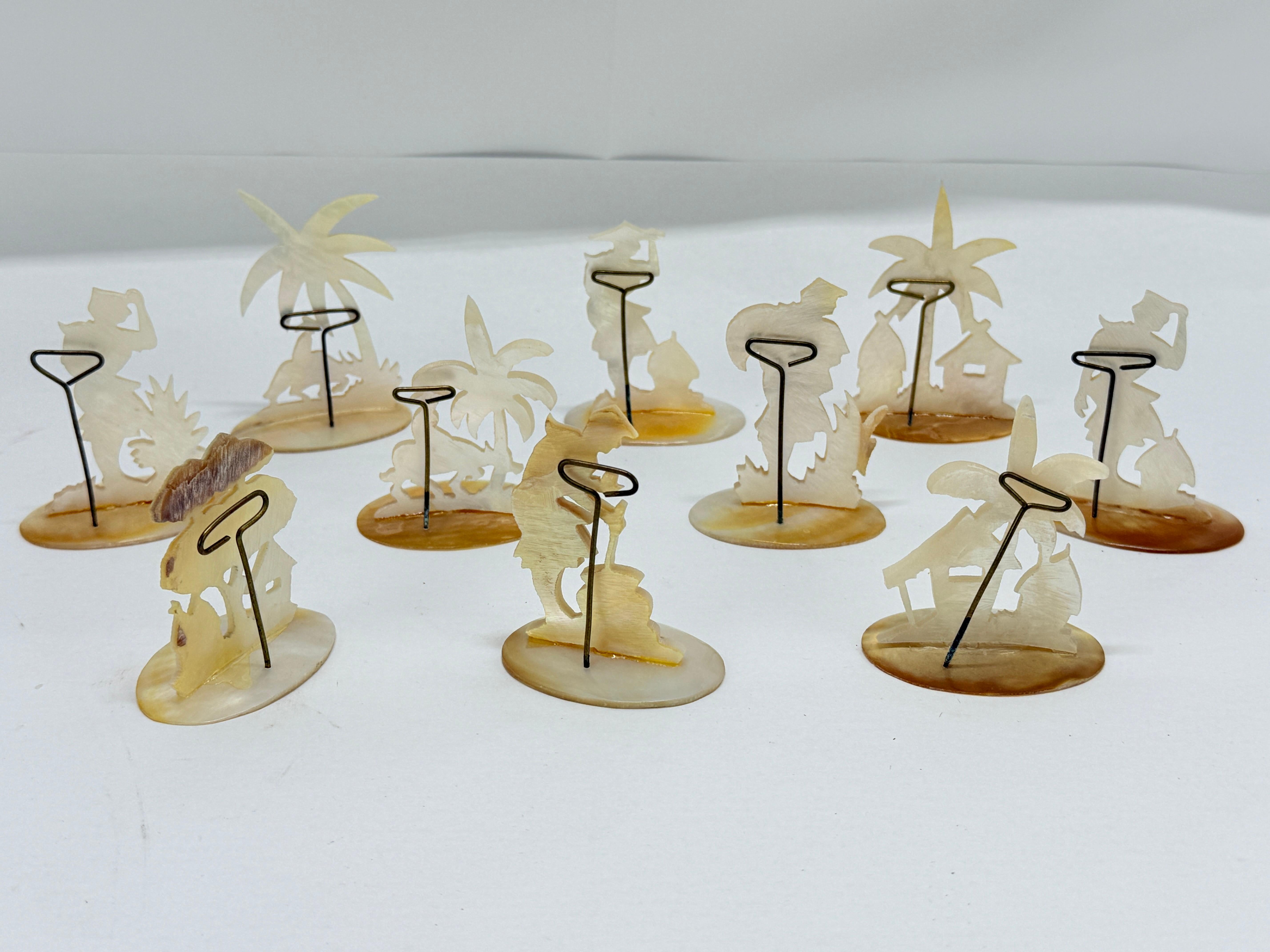 Set of Ten Carved Mother-of-Pearl Tropical Figural Place Card Holders (Britisch) im Angebot