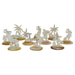 Set of Ten Carved Mother-of-Pearl Tropical Figural Place Card Holders