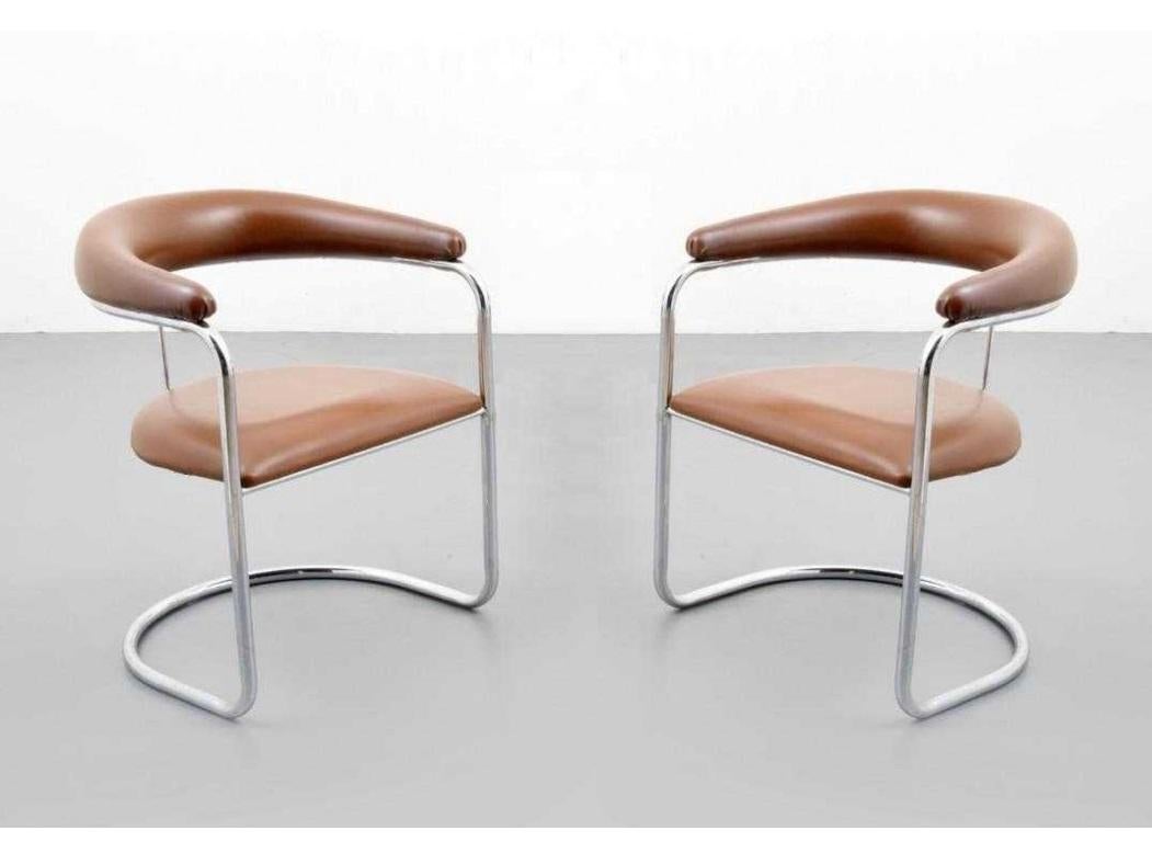 Set of ten armchairs designed by Anton Lorenz for Thonet. Each chair has tan upholstered backrest and seat with polished chrome tubular frames.

Mid-Century Modern S-37 chairs were originally designed by Anton Lorenz in 1929 and later manufactured