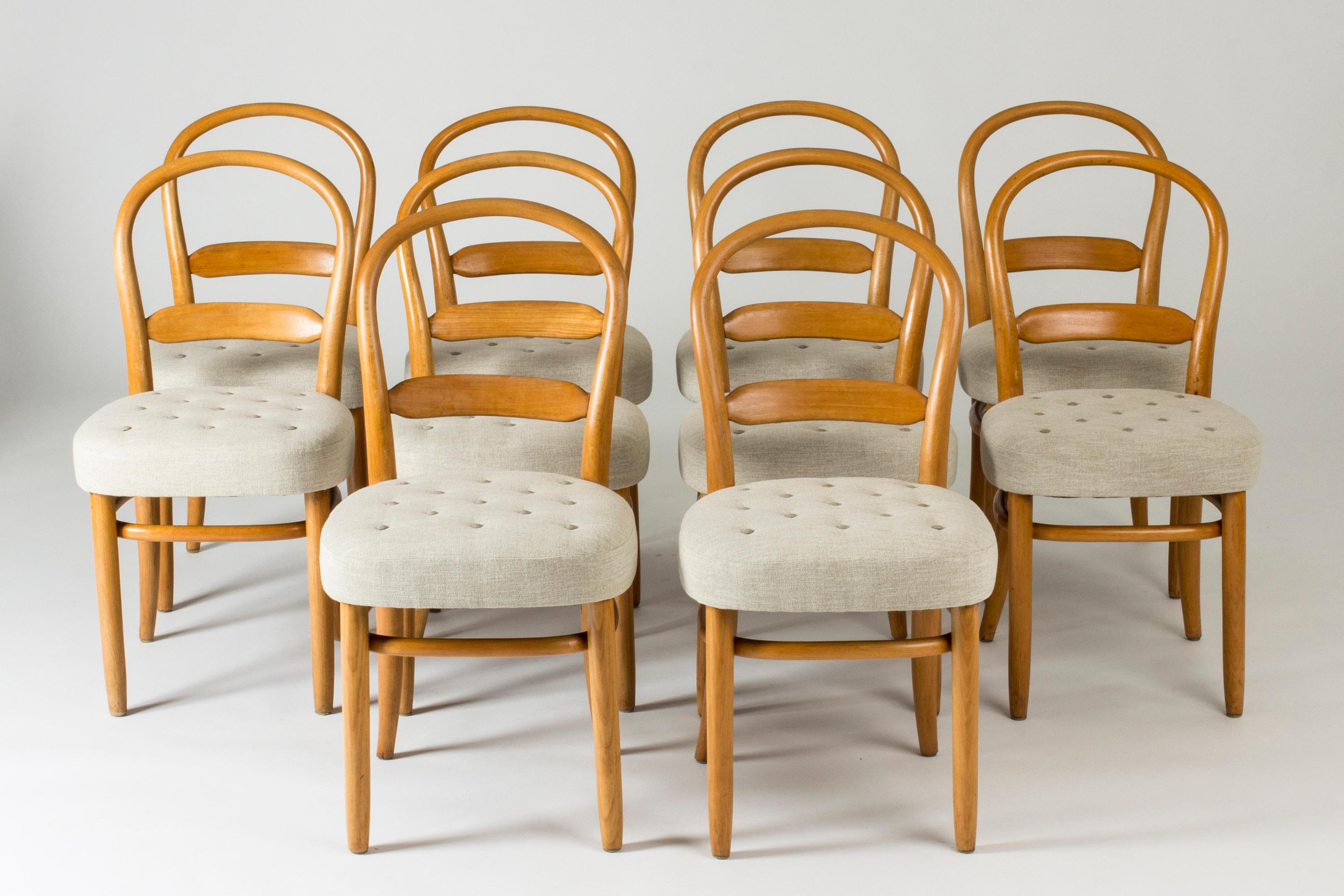 Set of ten dining chairs by Carl-Axel Acking, made from beech bentwood in a neat design with elegantly curved backs. These chairs were originally made in 1937 for Tösse Bakery in Stockholm.