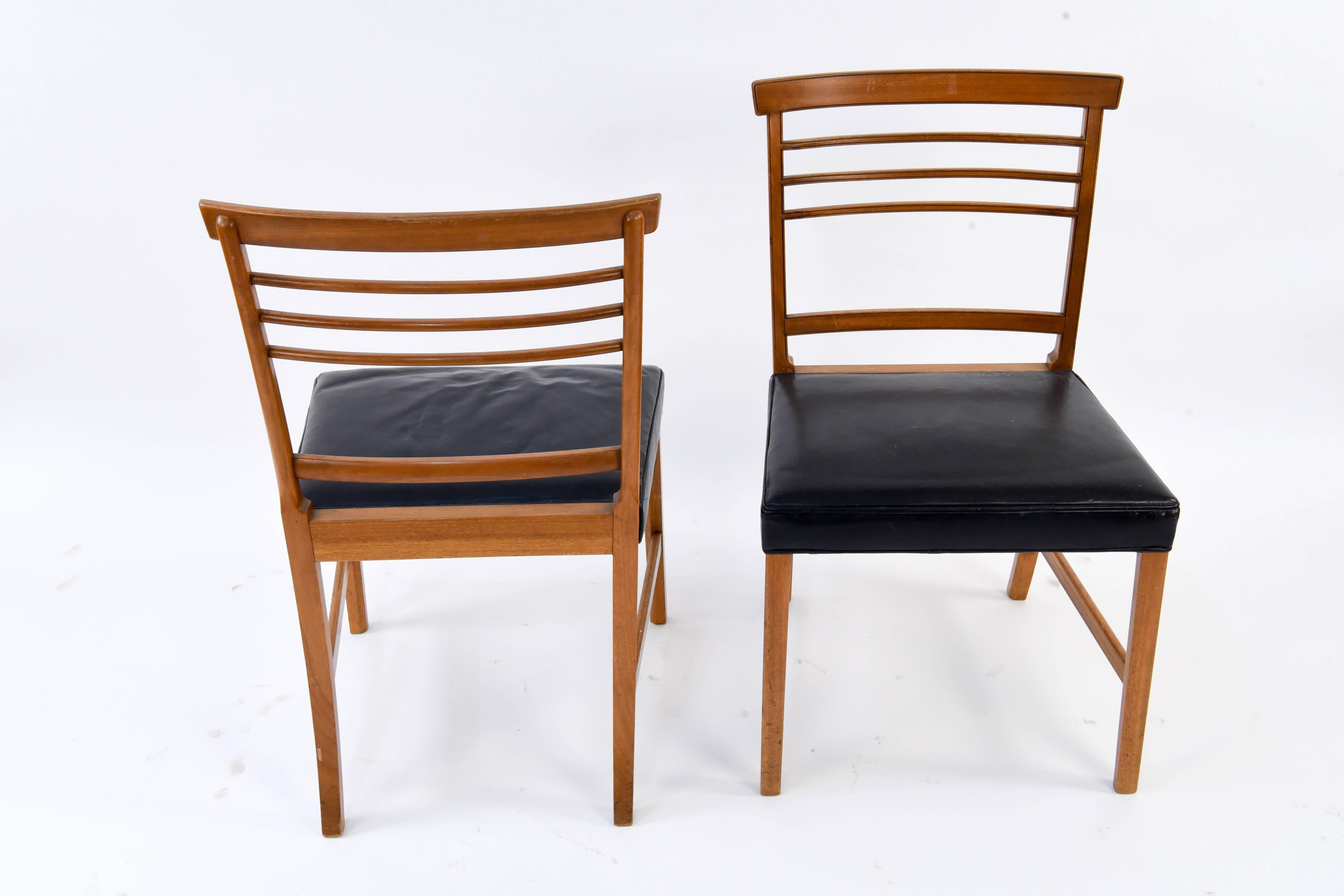 This is an incredible, large set of ten dining or side chairs. Designed by Ole Wanscher for AJ Iversen, circa 1950s. A great example of Danish midcentury design, and a great opportunity to get a large amount of matching chairs to fit around your