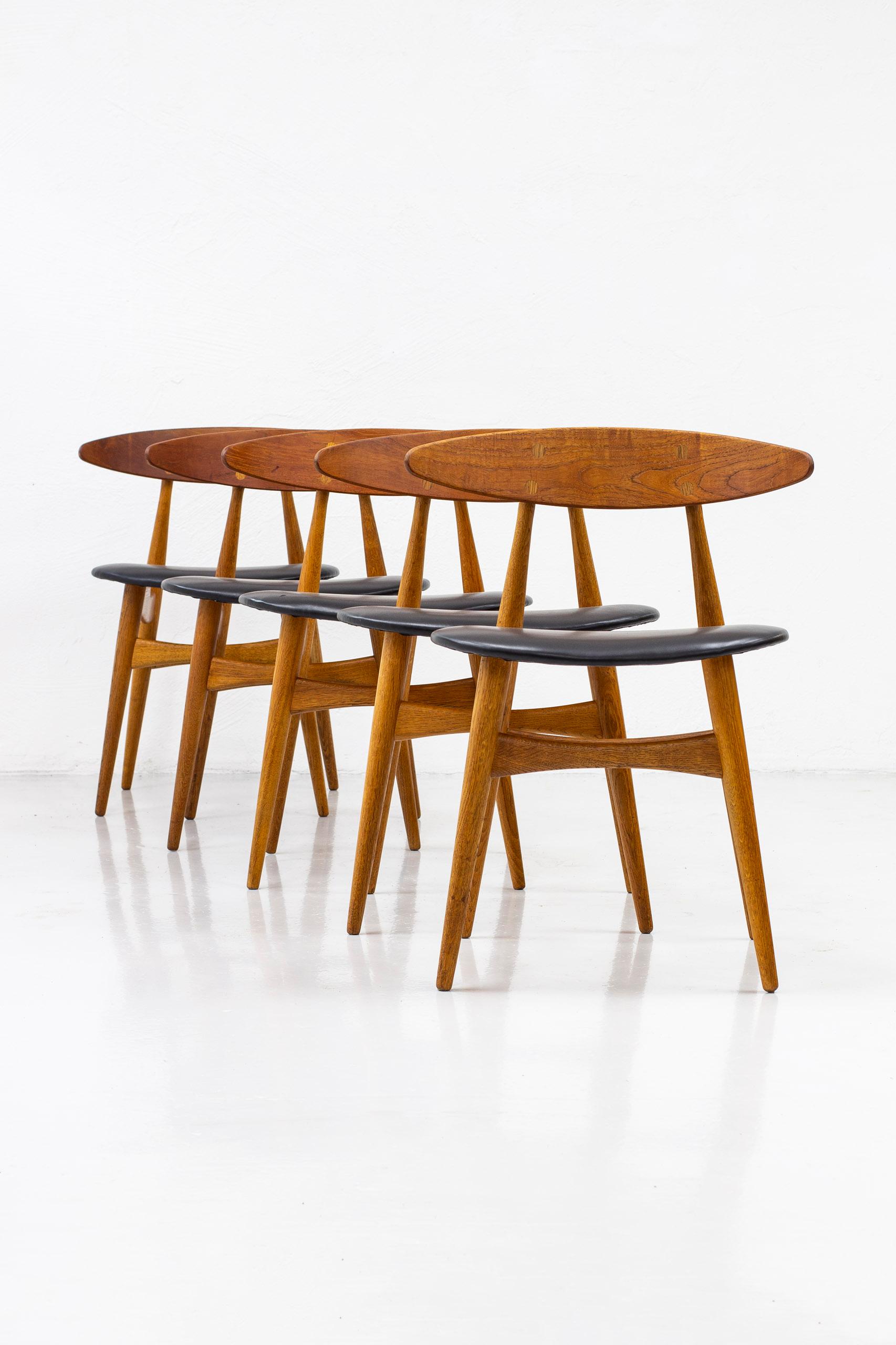 Danish Set of Ten Dining Chairs CH33 by Hans J. Wegner, Carl Hansen & Søn, Denmark