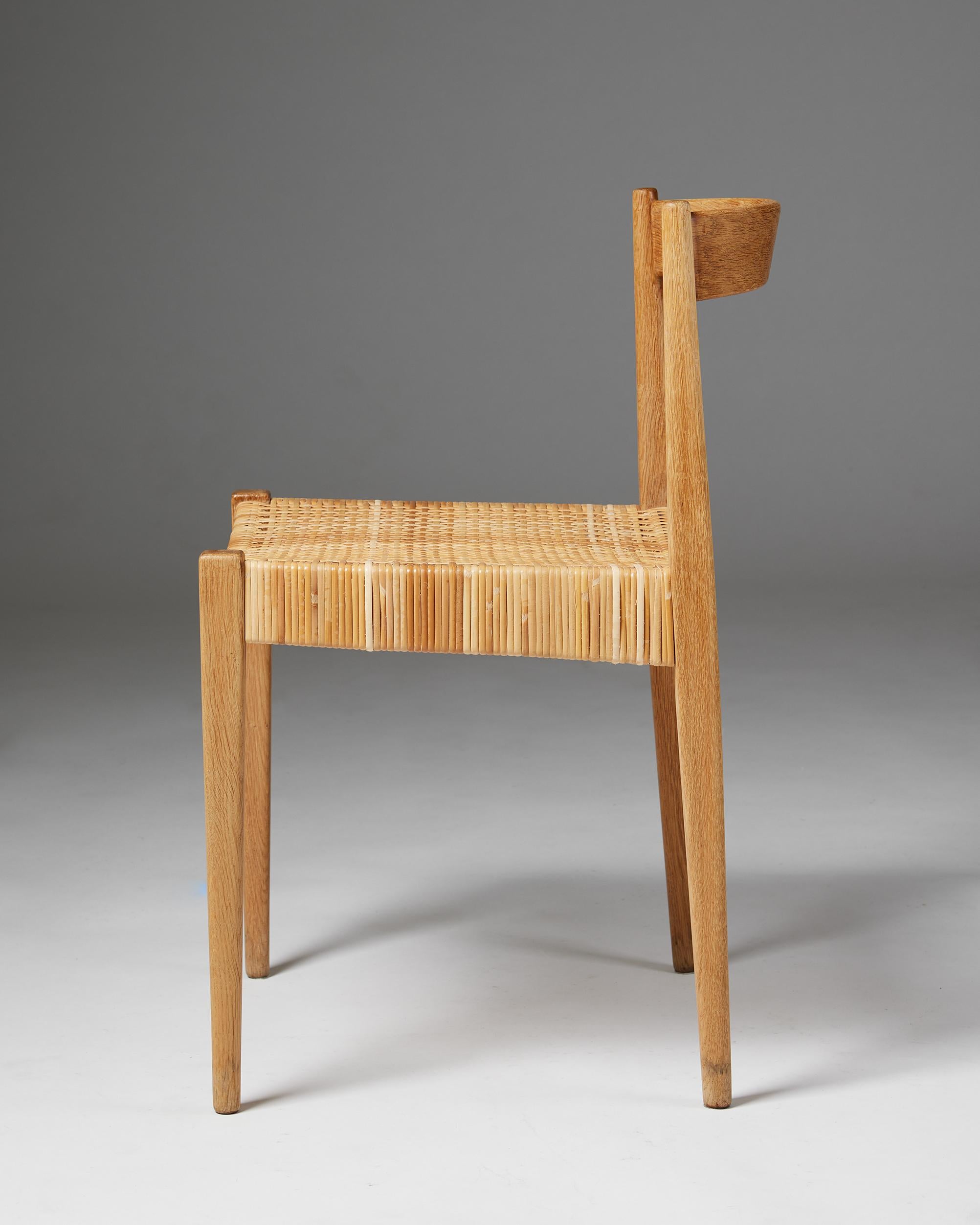 Rattan Set of Ten Dining Chairs Designed by Nanna and Jorgen Ditzel
