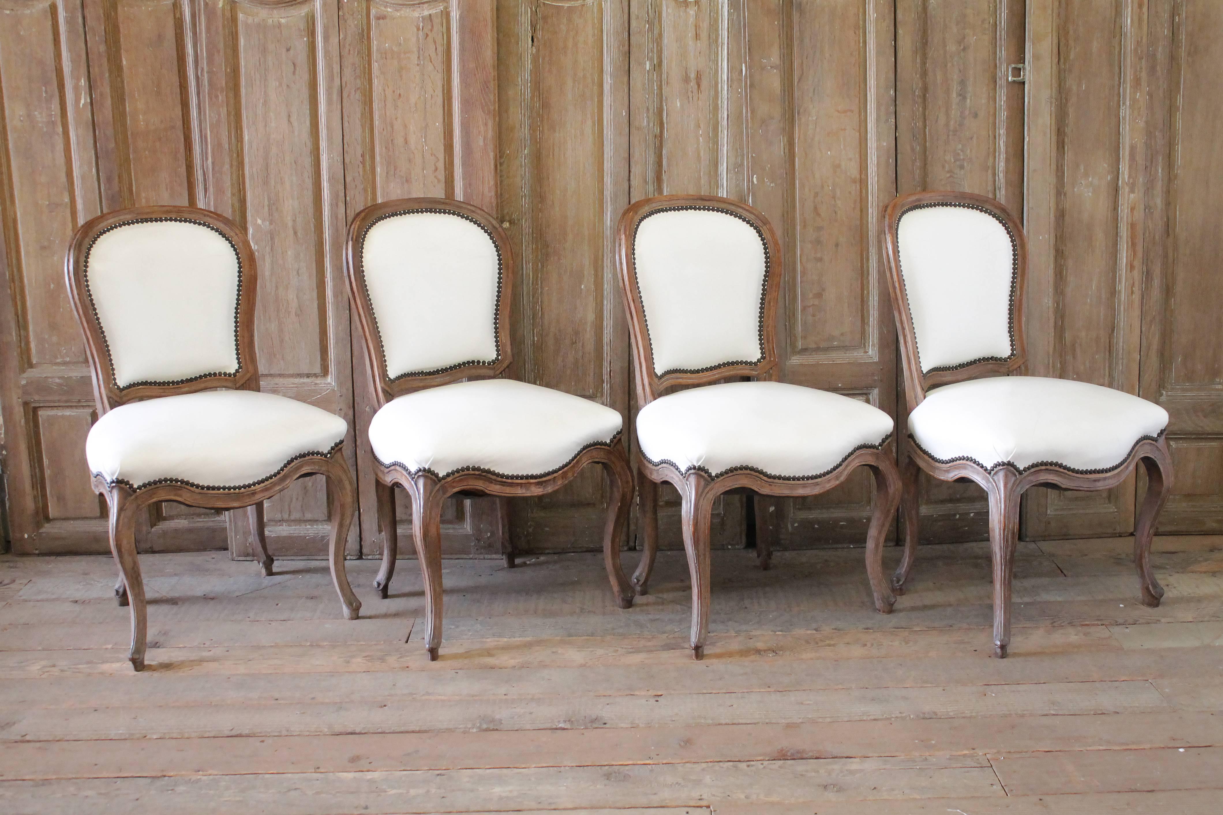 Set of Ten Early 20th Century Louis XV Style Dining Chairs in White Leather 7