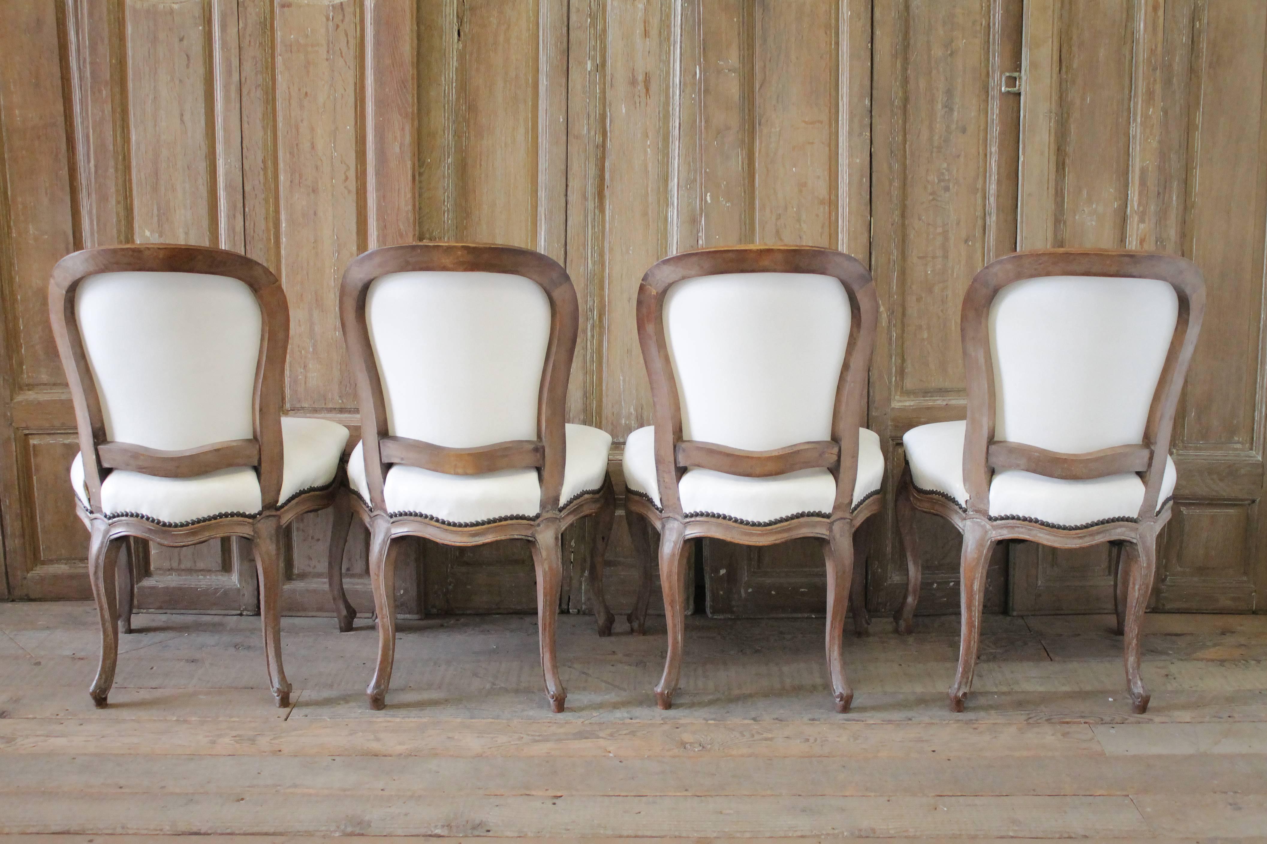 Set of Ten Early 20th Century Louis XV Style Dining Chairs in White Leather 2