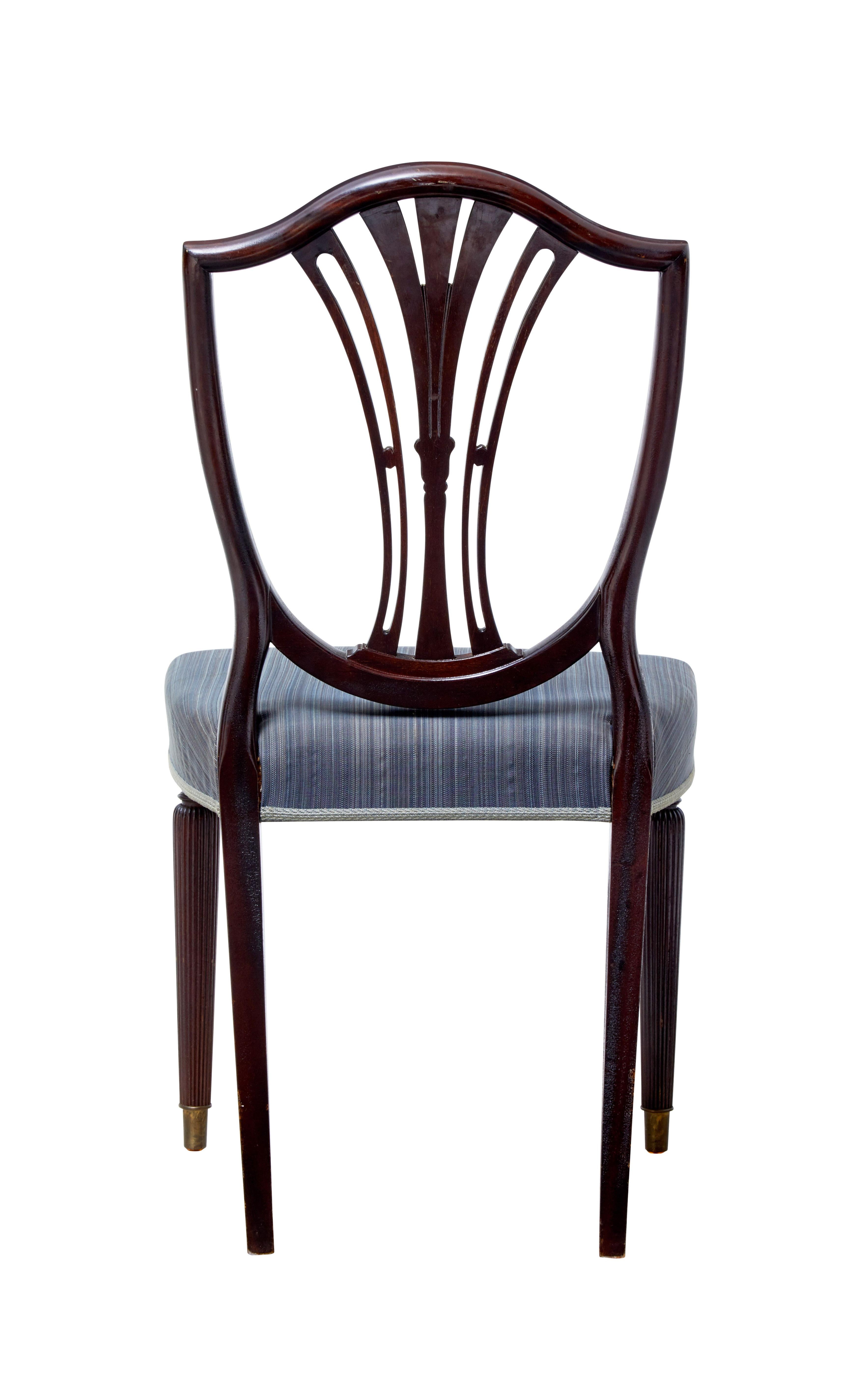 English Set of Ten Early 20th Century Mahogany Shield Back Dining Chairs