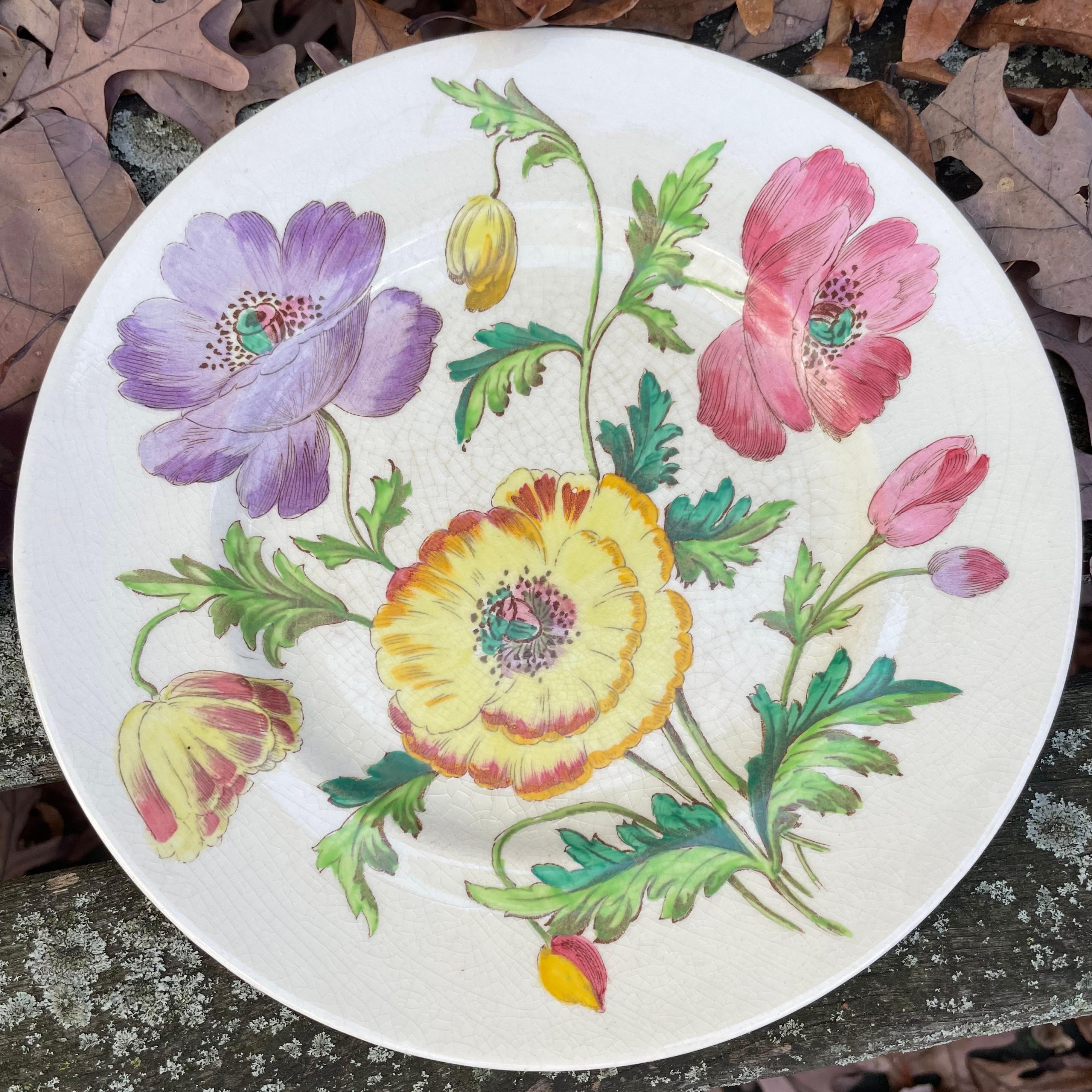 Set of ten English flower plates. Booths China plates each a different English flower with name on reverse. Nasturtium, Iris, Rose, Pyrethrum, Pansies, Daffodils, Poppies, Clematis, Carnation, Aster. England, 1930's.
Dimensions: 9