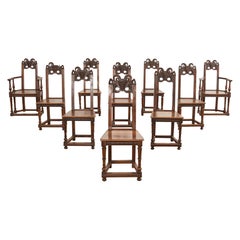 Set di dieci sedie da pranzo in stile barocco francese in legno di noce mascherato