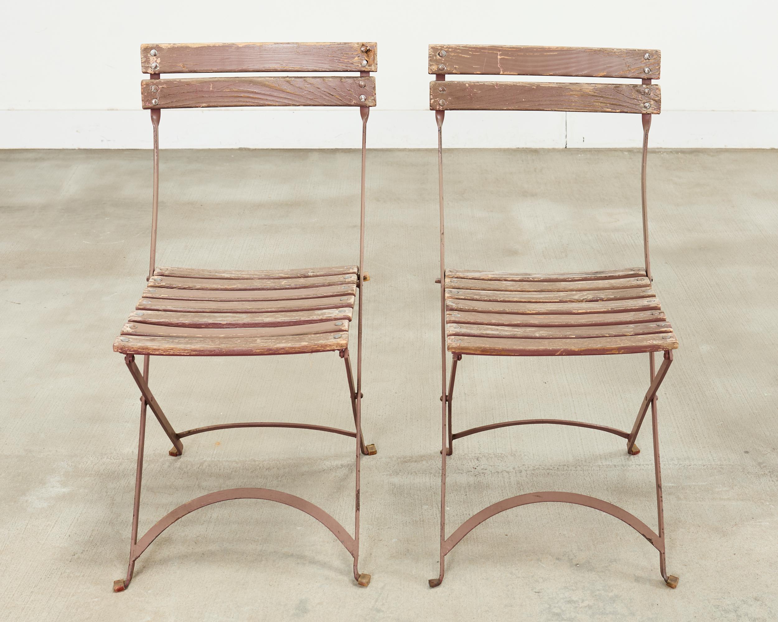 Set of Ten French Folding Iron Bistro Dining Chairs In Distressed Condition For Sale In Rio Vista, CA