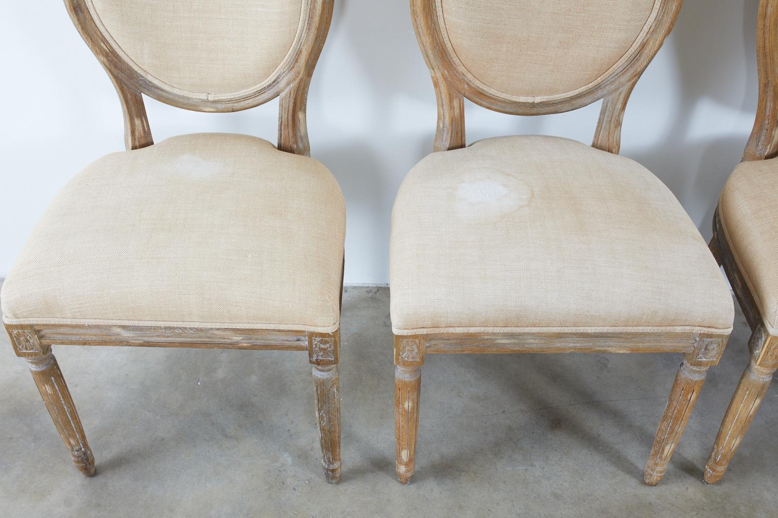 Set of Ten French Louis XVI Style Oak Dining Chairs 10