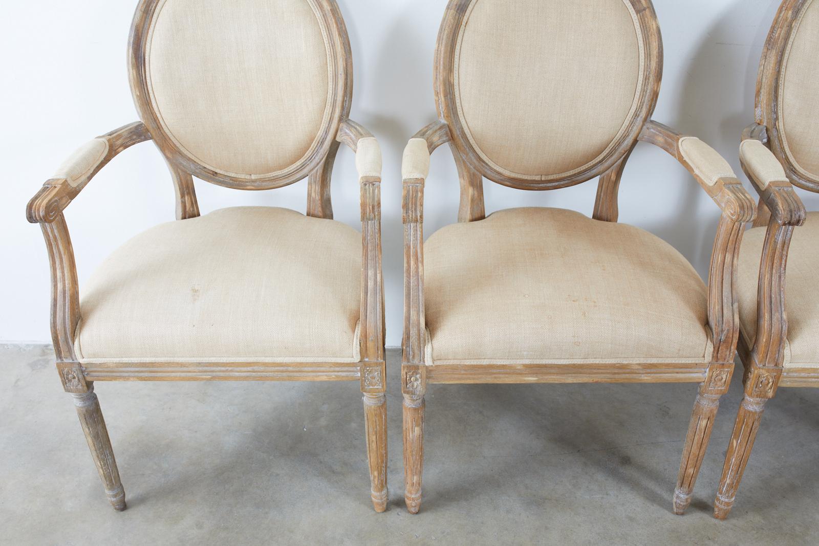 Set of Ten French Louis XVI Style Oak Dining Chairs 1