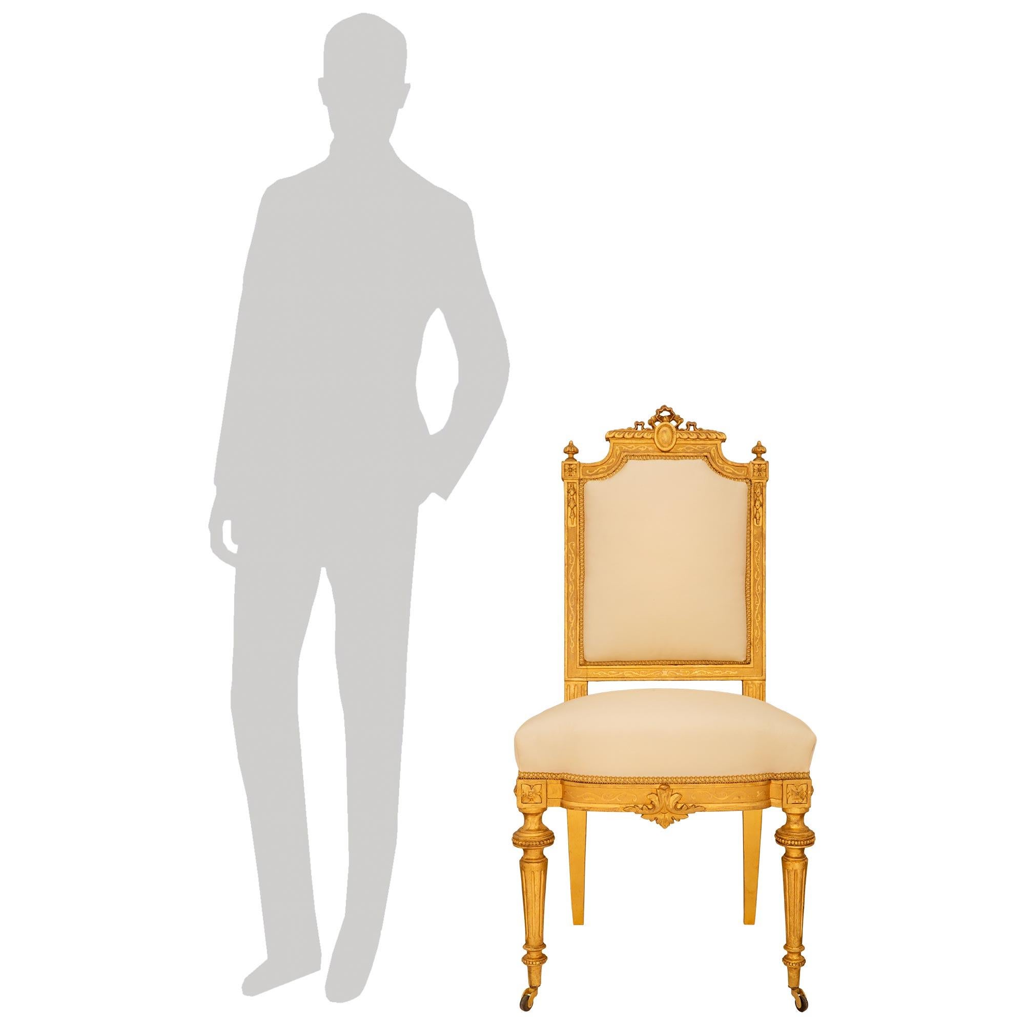 set of ten French mid 19th century Louis XVI st. Giltwood dining chairs In Good Condition In West Palm Beach, FL