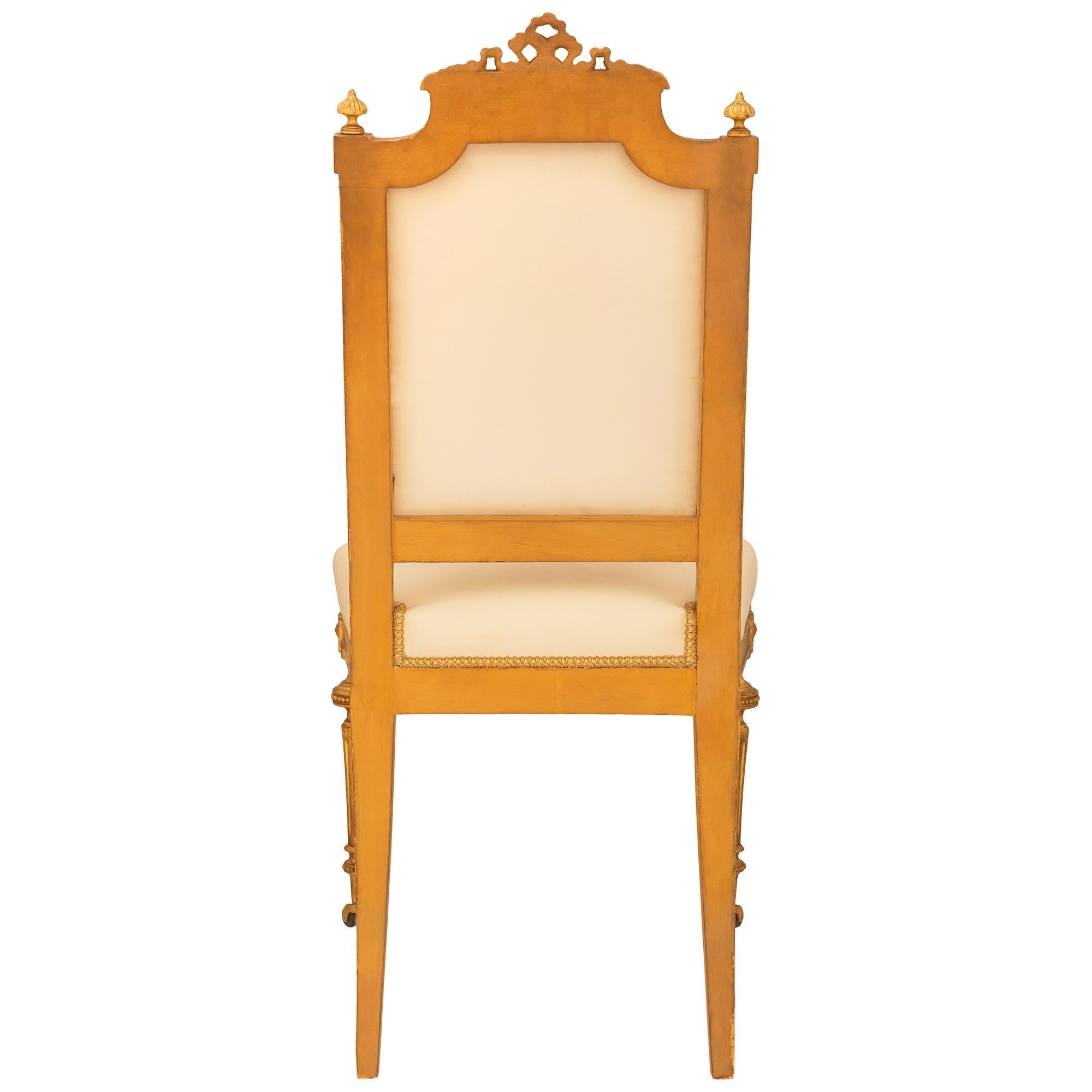 set of ten French mid 19th century Louis XVI st. Giltwood dining chairs 2