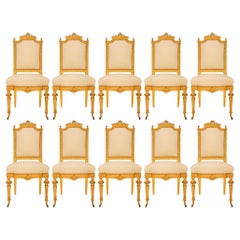 set of ten French mid 19th century Louis XVI st. Giltwood dining chairs