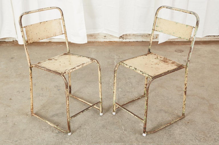 Set of Ten French Stackable Metal Bistro Cafe Chairs In Distressed Condition For Sale In Rio Vista, CA
