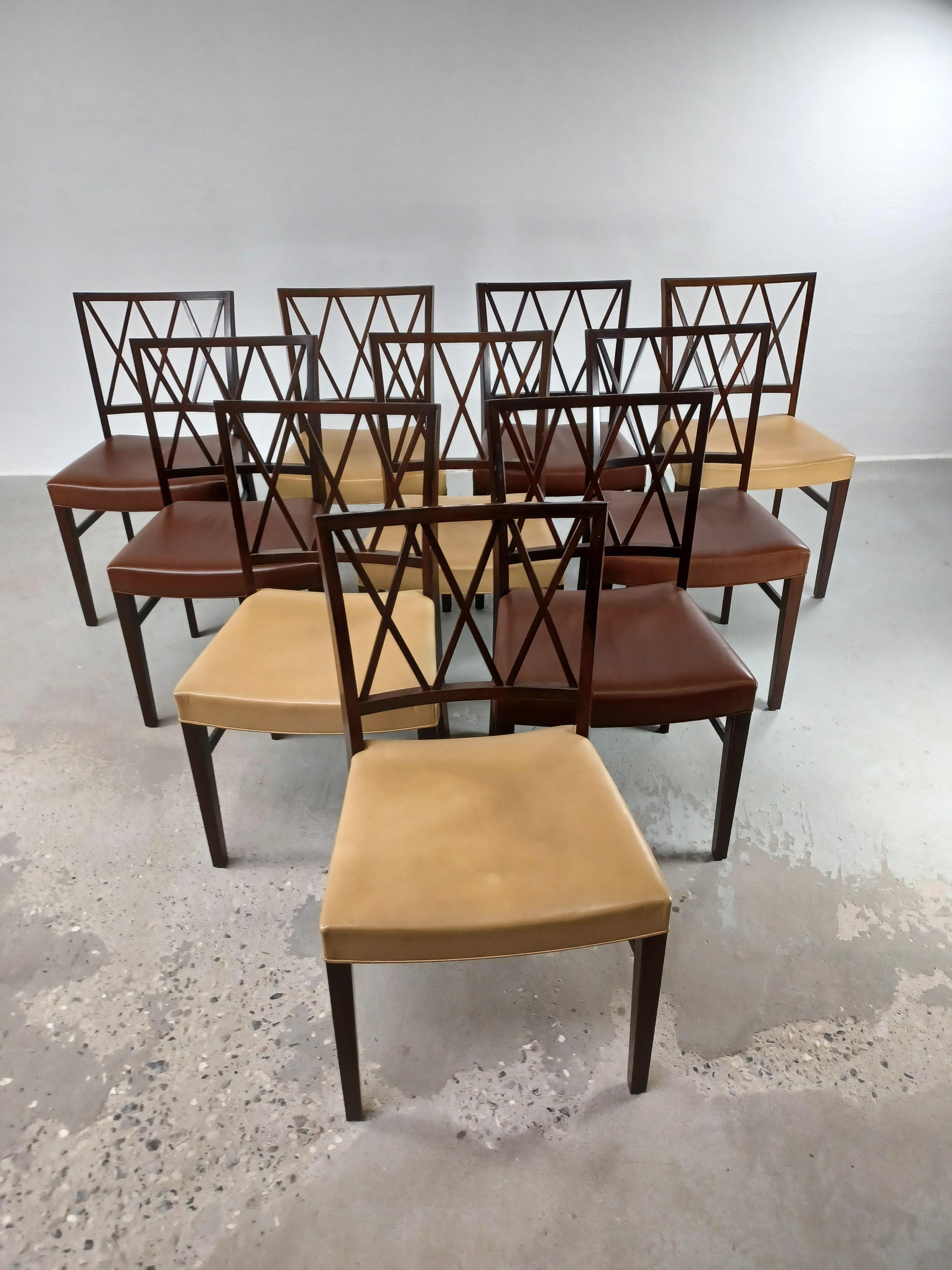 Set of ten fully restored Danish Ole Wanscher dining chairs custom reupholstery included.

The chairs with their solid yet at the same time light and elegant lines and small details feature Ole Wanschers deep sense of style, design and craftmanship