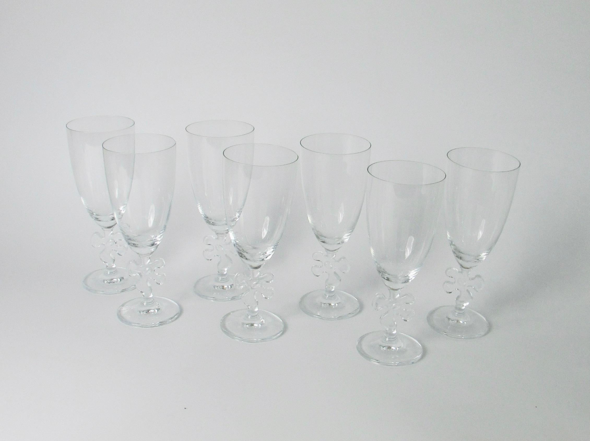 Cast Set of Ten Fun and Fancy Marc Aurel Water Glasses with Jigsaw Stem For Sale