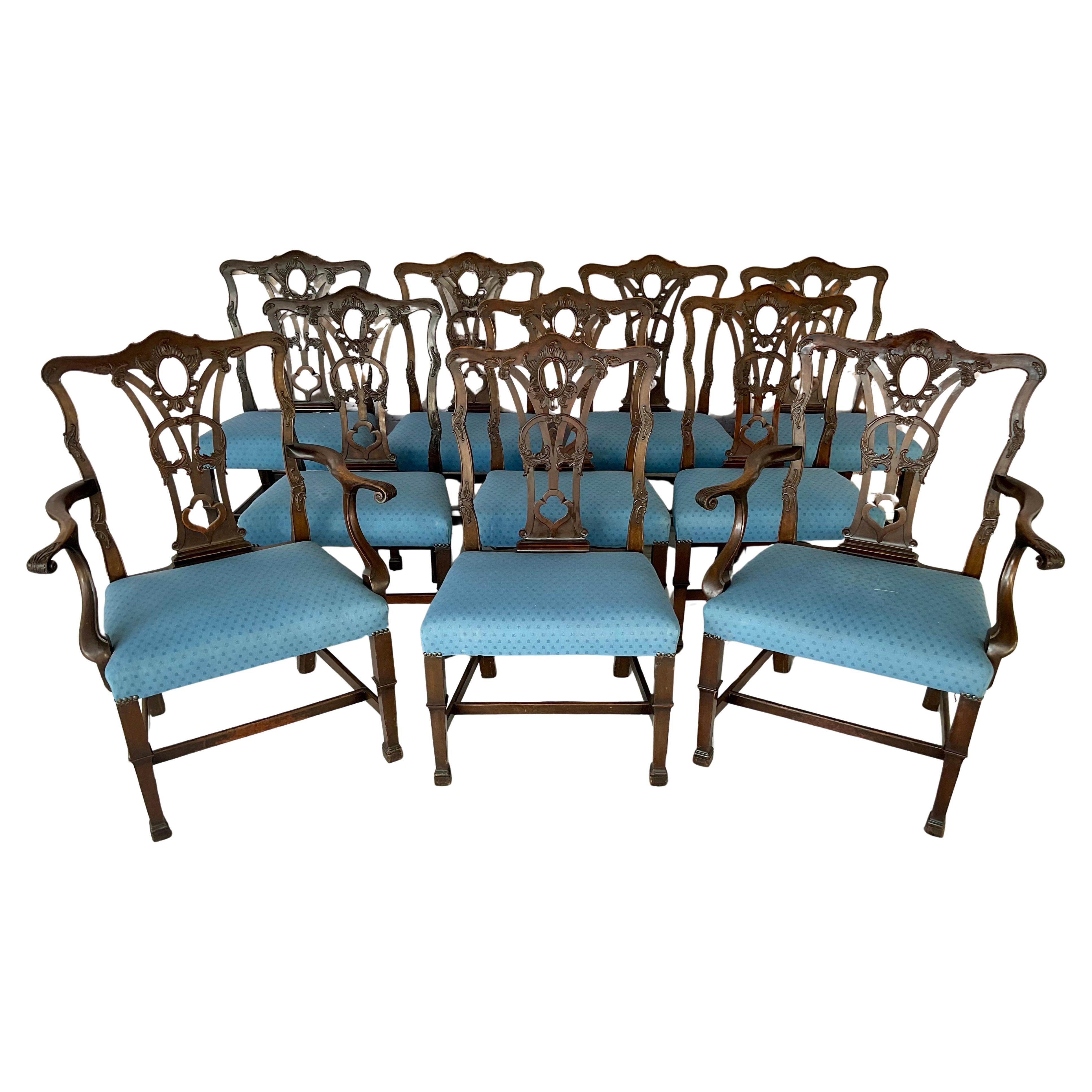 Fabulous Set of Ten Late 19th Century Georgian Chippendale Style Carved Mahogany Dining Chairs. Each chair features a pierced and intricately carved back splat with scrolling acanthus details, shaped crest rails, and hand-carved ornamentation