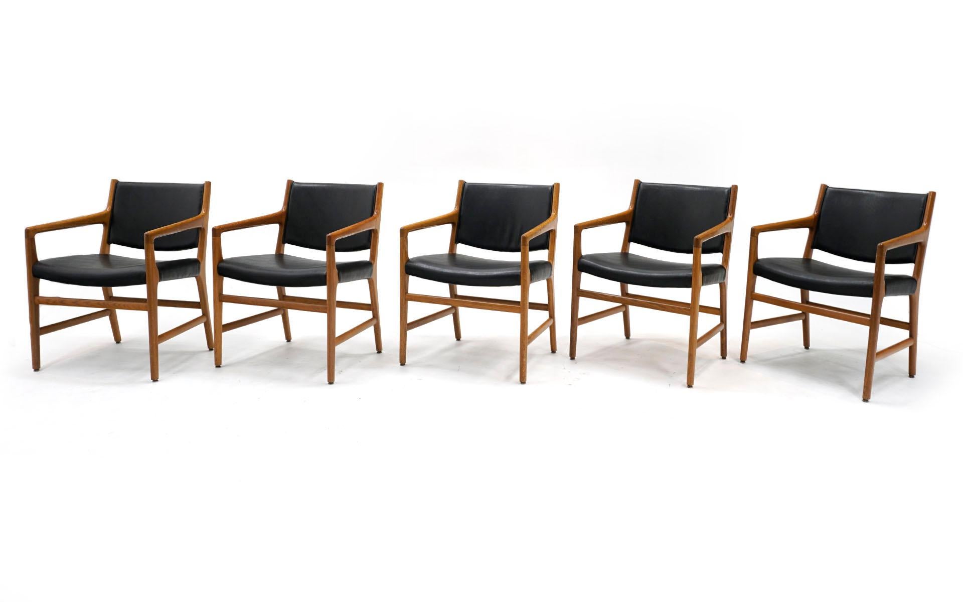 Set of 10 Hans Wegner dining chairs, all armchairs, in oak and black leather for Johannes Hansen, Model JH507. This set of Hans Wegner chairs came directly from the Francis A. Countway Library of Medicine at the Harvard Medical School. This building
