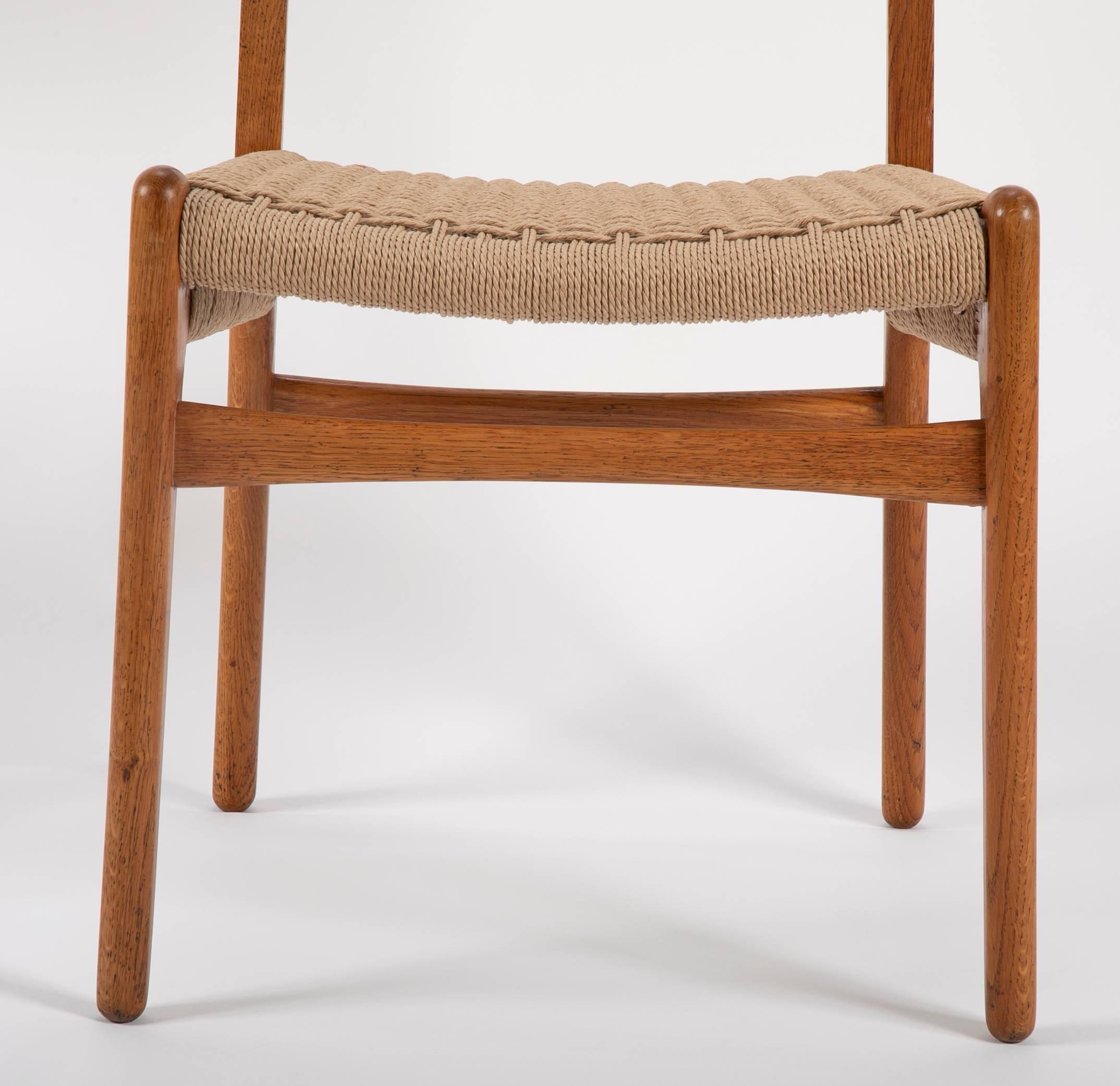 Set of Ten Hans Wegner Oak and Paper Cord Model CH-23 Dining Chairs In Good Condition In Stamford, CT