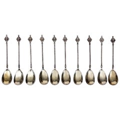 Set of Ten Ice Cream Spoons with Angelic Face Motifs