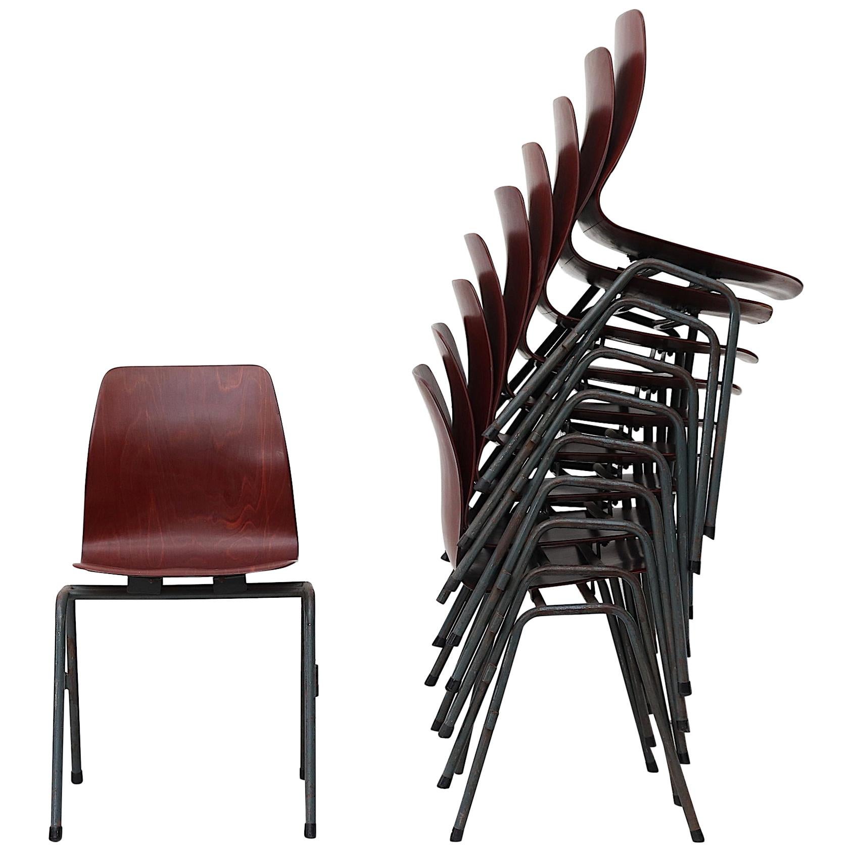 Set of ten Dutch mid-century  stacking chairs with single shell seat For Sale
