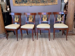 Set of Ten Italian Neoclassical Parcel Gilt Walnut Dining Chairs