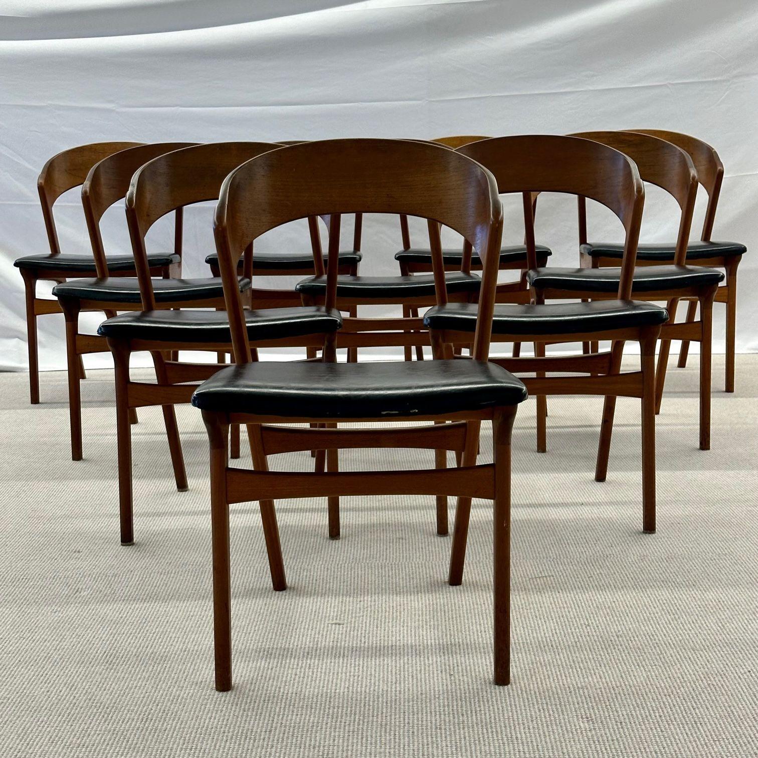 Set of Ten Kai Kristiansen Style Mid-Century Modern Dining / Side Chairs, Danish
 
Ten sculptural teak Danish design dining chairs from the Mid-Century time period. Original wooden frames and vinyl seats.
 
Teak, Vinyl
United States, 1970s
 
32