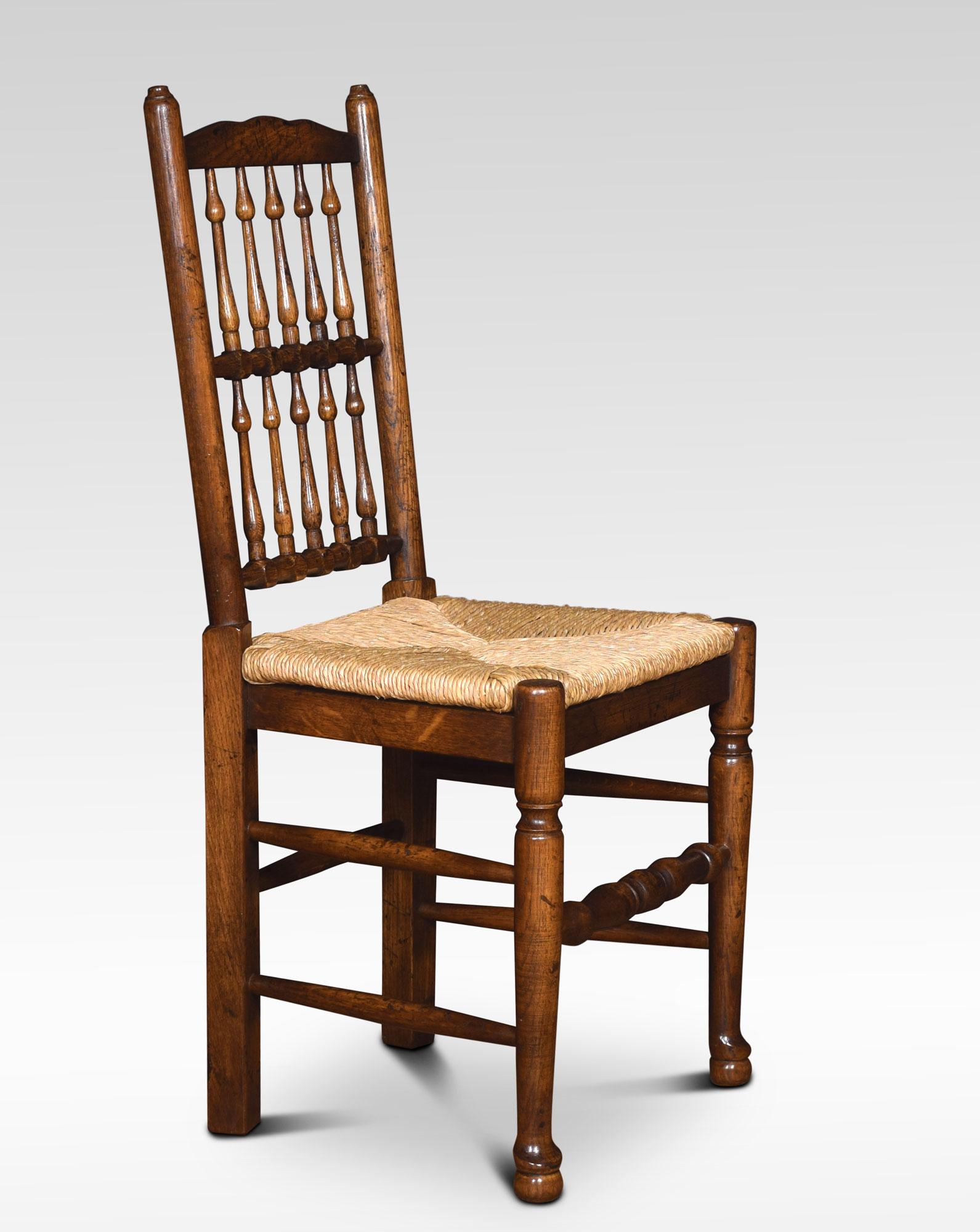 Set of ten high back dining chairs. The spindle backs above the rush seats, all raised up on turned tapering front supports united by stretchers.
Dimensions:
Height 40 inches height to seat 19 inches
Width 19 inches
Depth 15.5 inches.