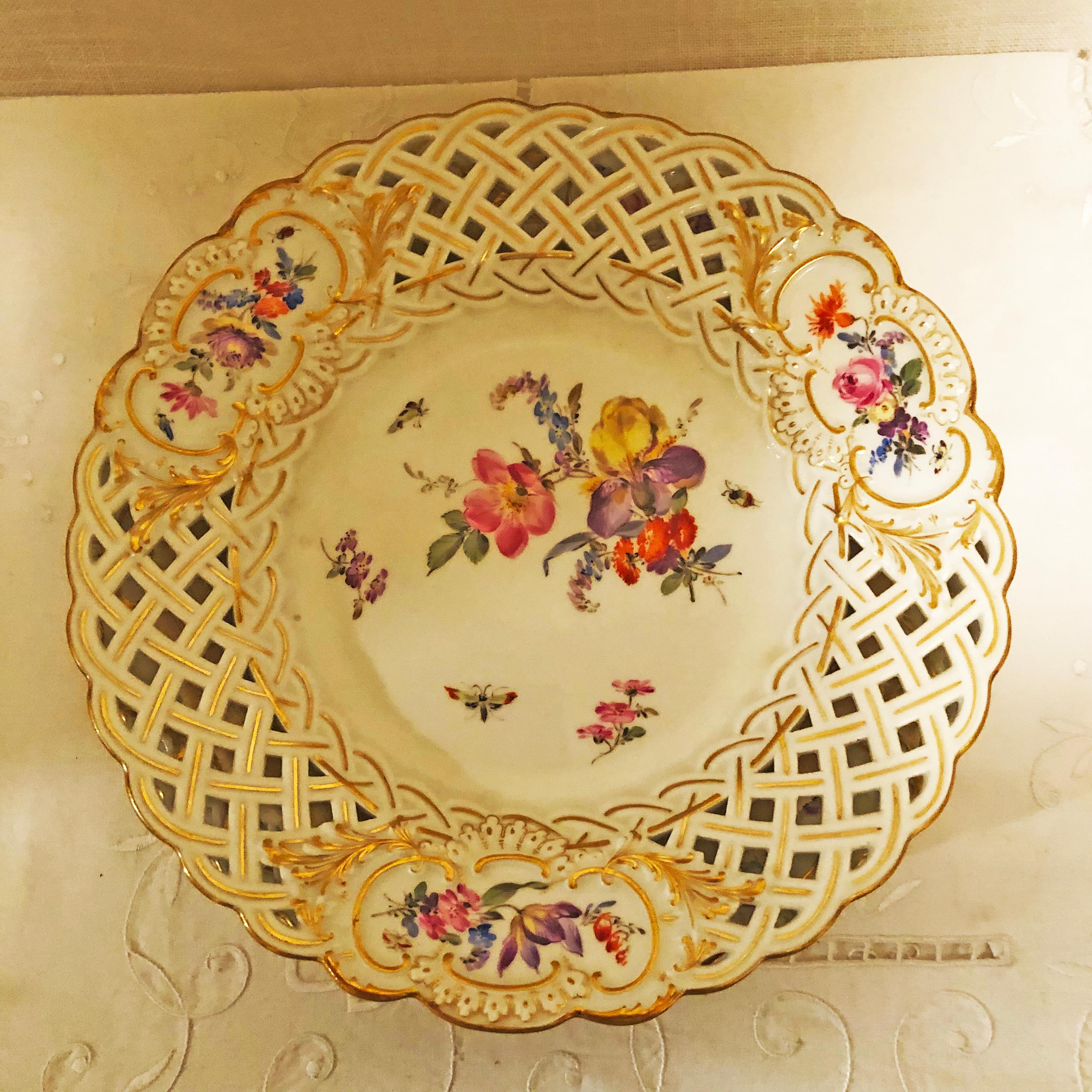 Romantic Set of Ten Meissen Reticulated Dessert Plates Painted with Flowers and Insects